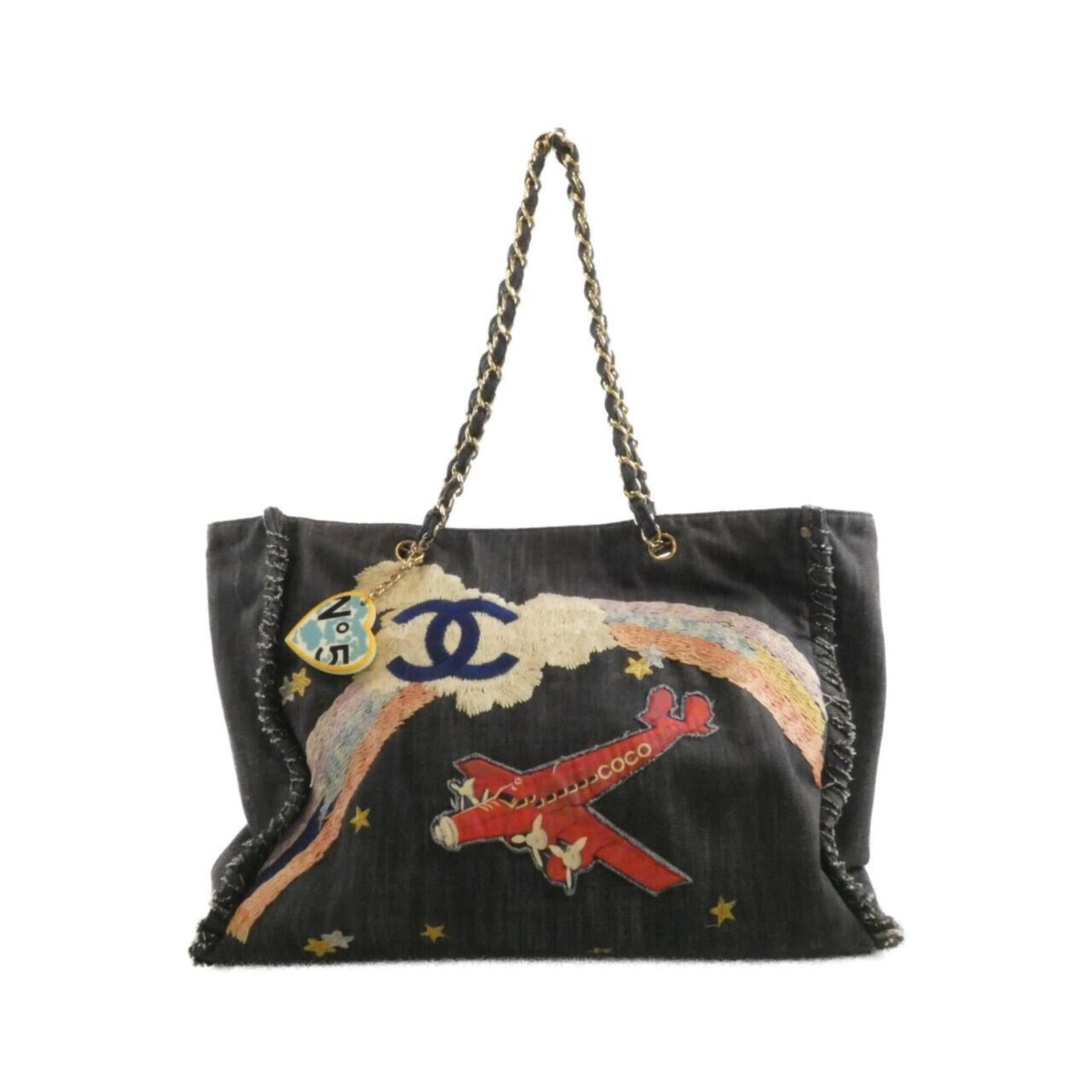 Chanel denim handbag: Chanel denim handbag Chanel's iconic denim handbag boasts a striking blue and red color combination, making it a standout piece. With its durable denim material and compact size, this bag is perfect f