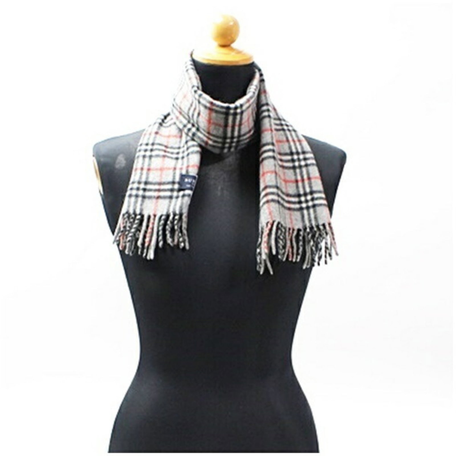 Cashmere Stole By Burberry: Cashmere Stole By Burberry Cashmere Stole by Burberry features luxurious gray cashmere material and a classic stole design. Measuring 1.13m x 22cm, it offers a stylish addition to any wardrobe. The it