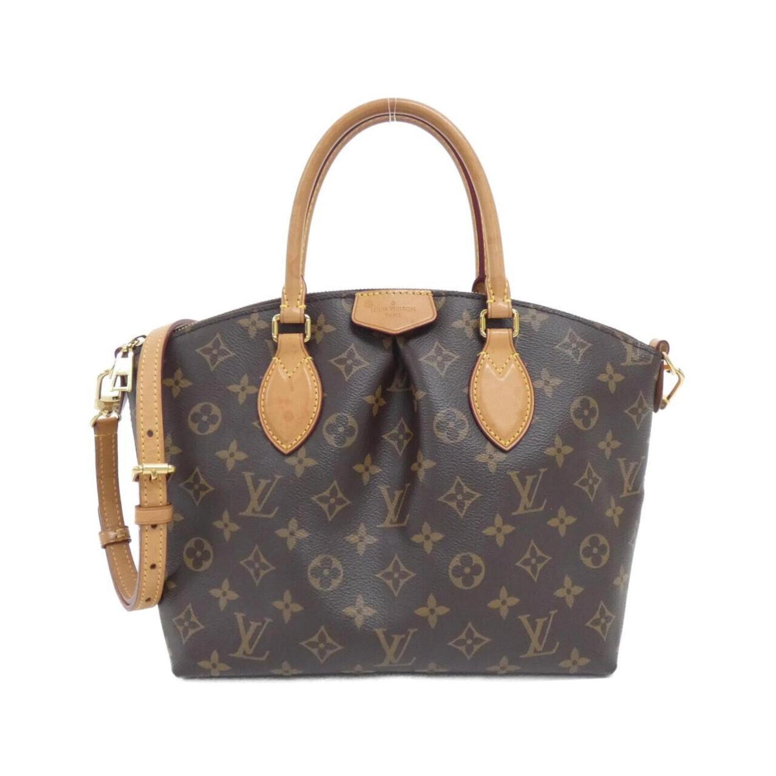 Canvas Coated Louis Vuitton Handbag: Canvas Coated Louis Vuitton Handbag Canvas Coated Louis Vuitton Handbag. Made from coated canvas, this bag features the iconic brown color and classic design. With its compact size and durable constru