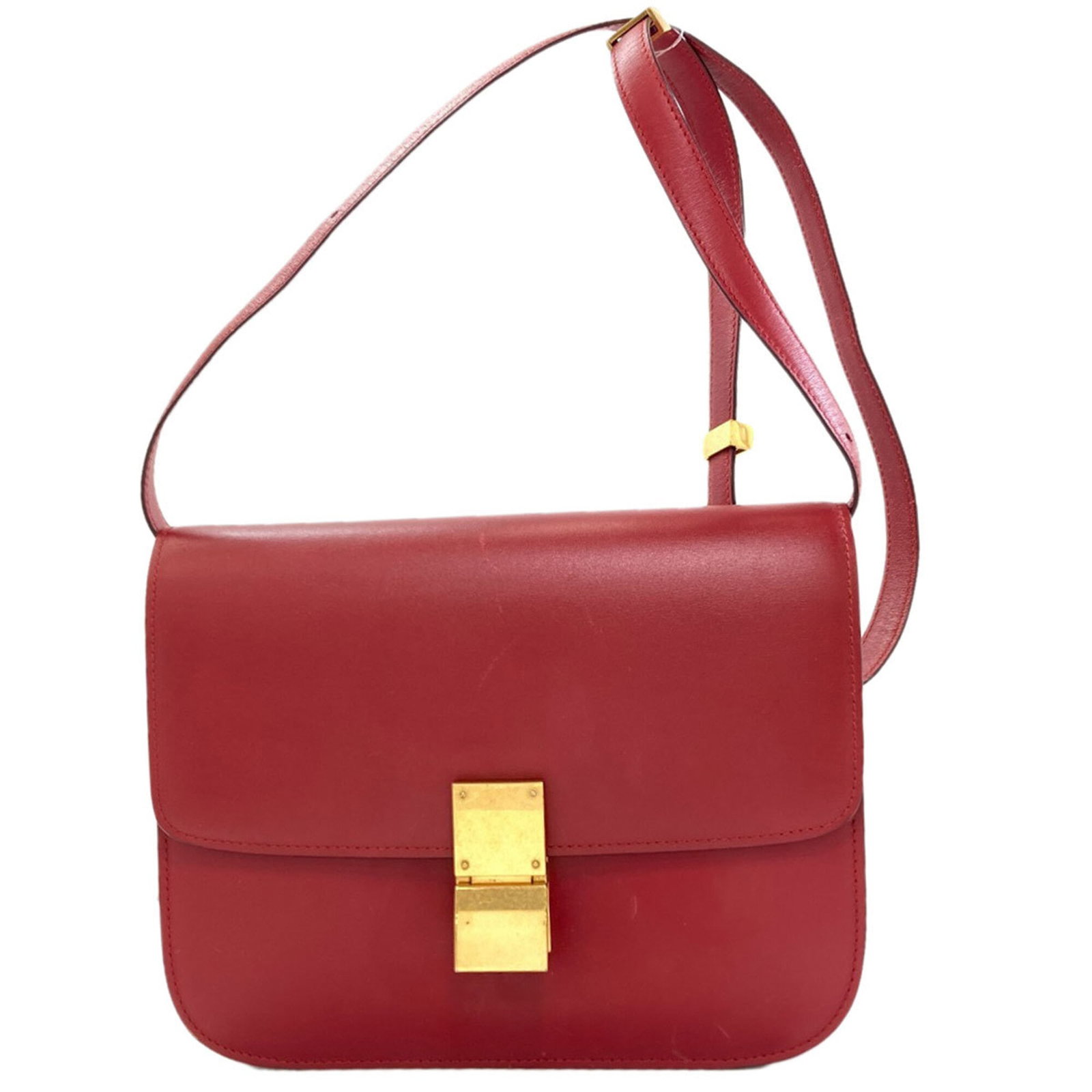 Celine bag leather: Celine bag leather Red Celine bag made from high-quality calfskin leather, measuring 18cm x 23cm x 6cm. This stylish shoulder bag boasts a striking red color and premium leather construction. Its