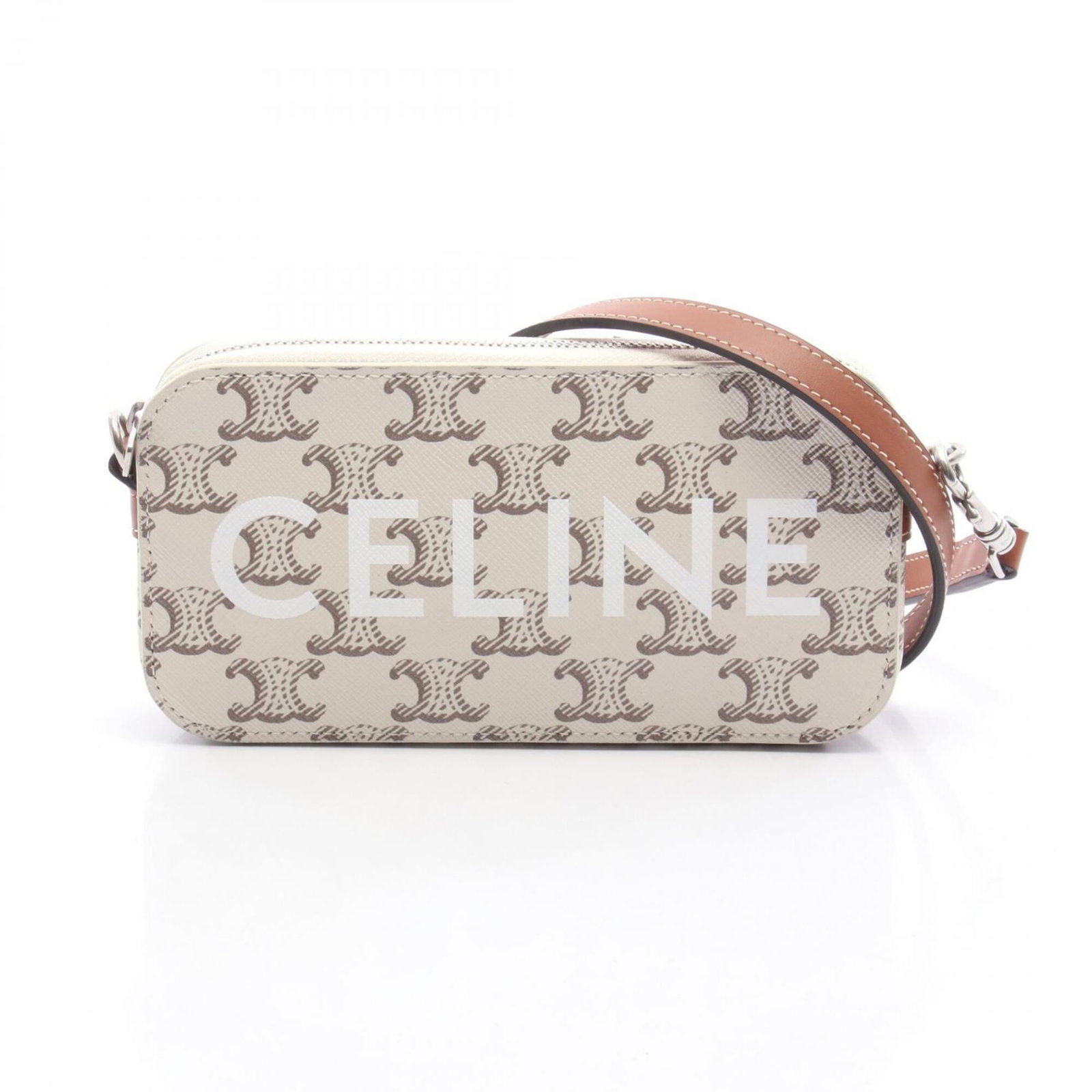 Coated canvas leather handbag shoulder bag by Celine: Coated canvas leather handbag shoulder bag by Celine Coated canvas leather handbag shoulder bag by Celine features a unique combination of materials and design. The brown and white color scheme adds
