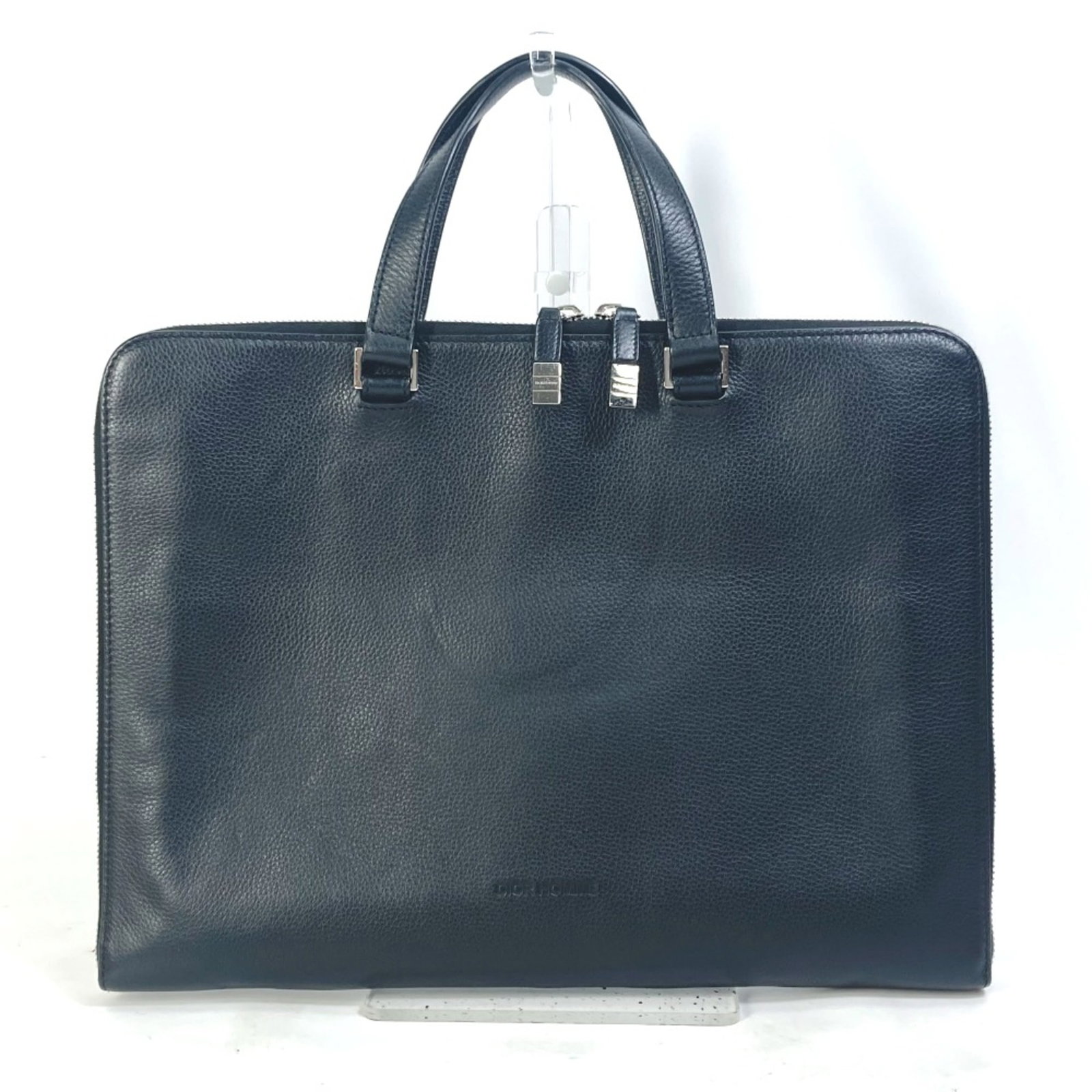Homme Leather Briefcase Dior: Homme Leather Briefcase Dior Black leather briefcase from Dior Homme, measuring 34cm x 26cm in width and height. The case features high-quality leather construction with a classic design. This stylish