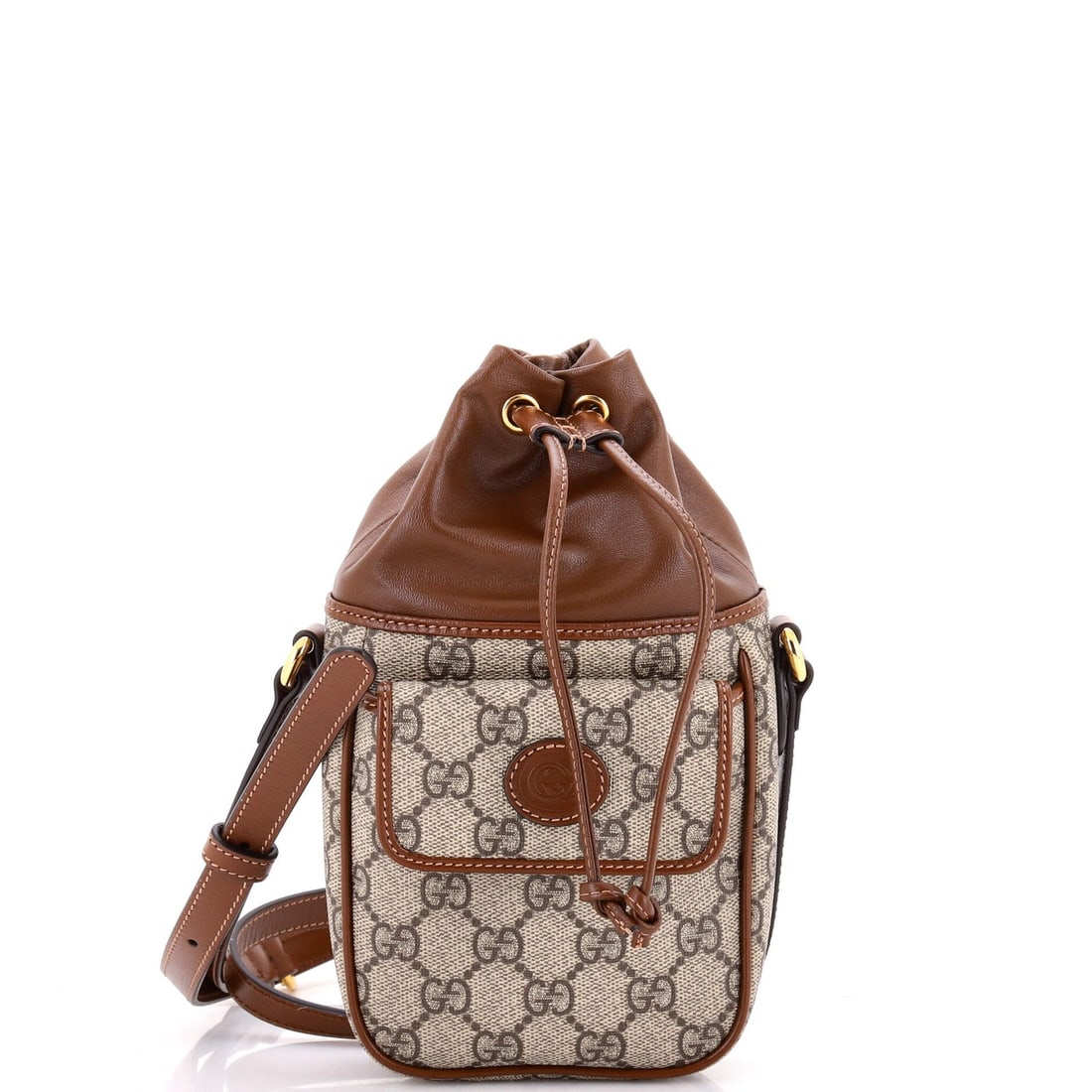 Gucci Interlocking G patch coated canvas mini bag: Gucci Interlocking G patch coated canvas mini bag The Gucci Interlocking G patch coated canvas mini bag boasts a sleek, bucket-style design with a signature brown exterior. Measuring just 8.5" tall