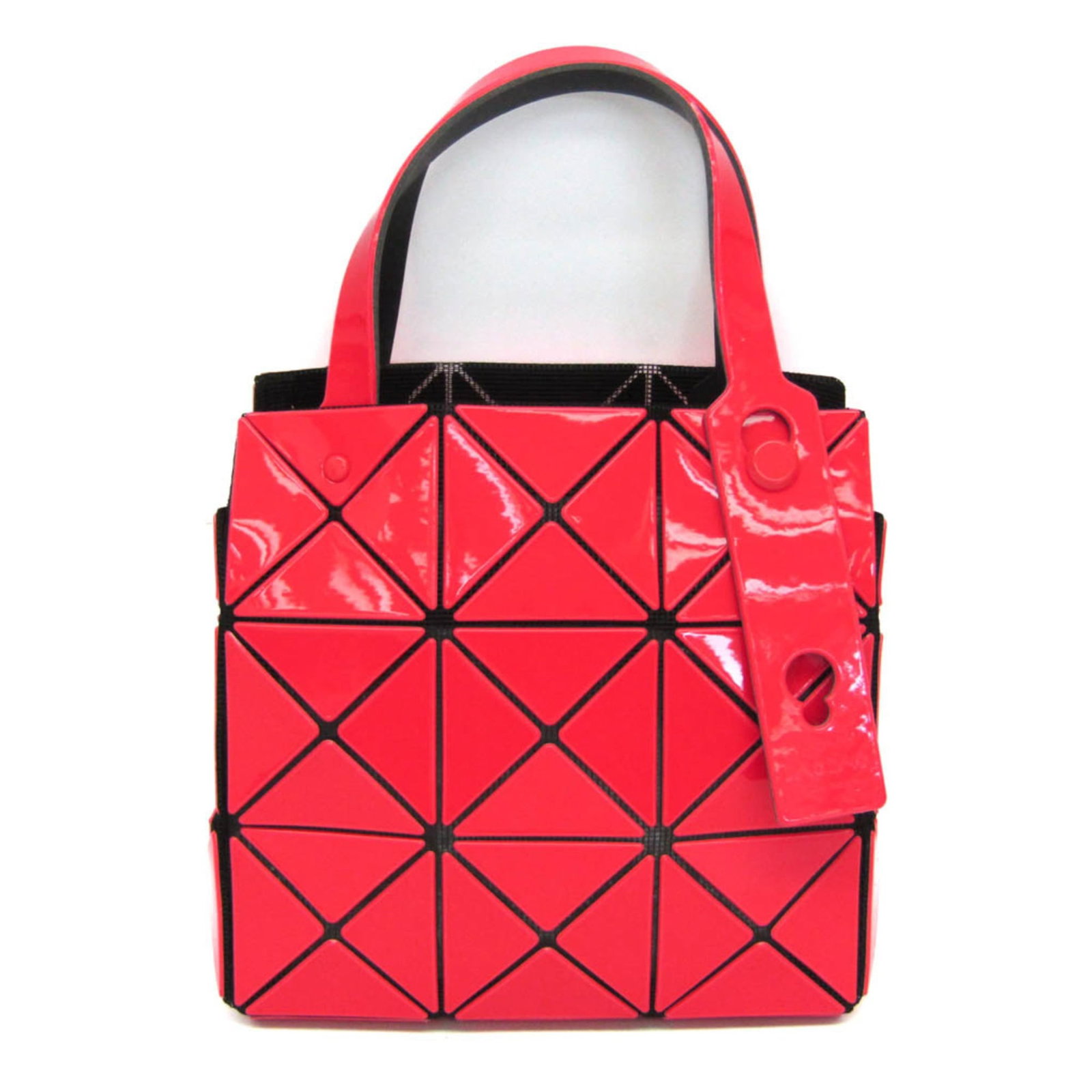 Miyake Handbag Polyester Faux Leather: Miyake Handbag Polyester Faux Leather The Issey Miyake BAOBAO handbag features a striking pink color and open design, with an inner pocket for added convenience. Made from high-quality polyester faux