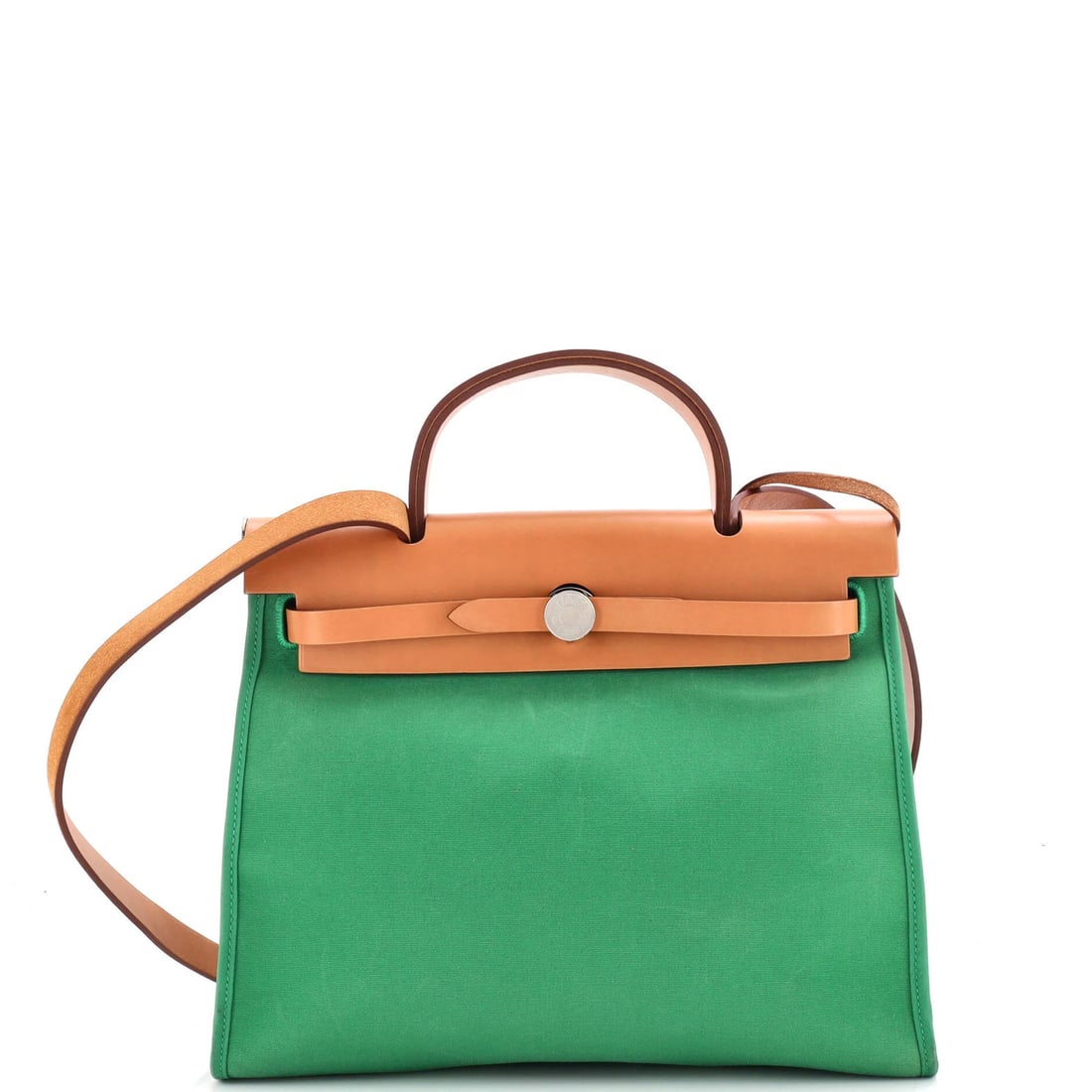 Hermes Herbag Zip Leather and Toile 31: Hermes Herbag Zip Leather and Toile 31 The Hermes Herbag Zip Leather and Toile 31 is a stylish shoulder bag with a unique blend of green leather and canvas. Its distinctive zip closure and classic des