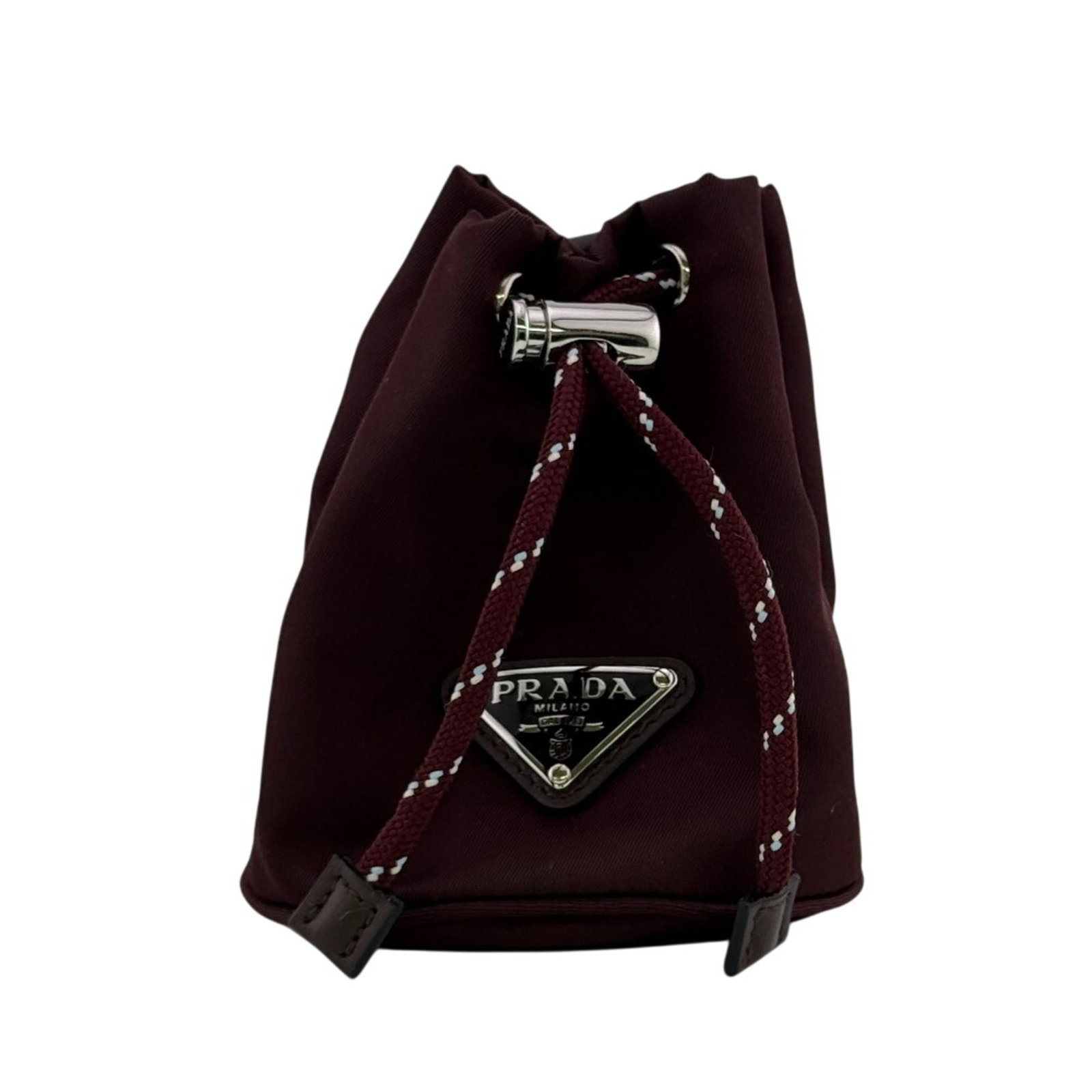 Key Chain Nylon: Key Chain Nylon Key Chain Nylon, Prada, Brown. Made from durable nylon, this key chain measures 10cm x 8.5cm x 9cm and features a distinctive brown color. A functional accessory with its compact size.