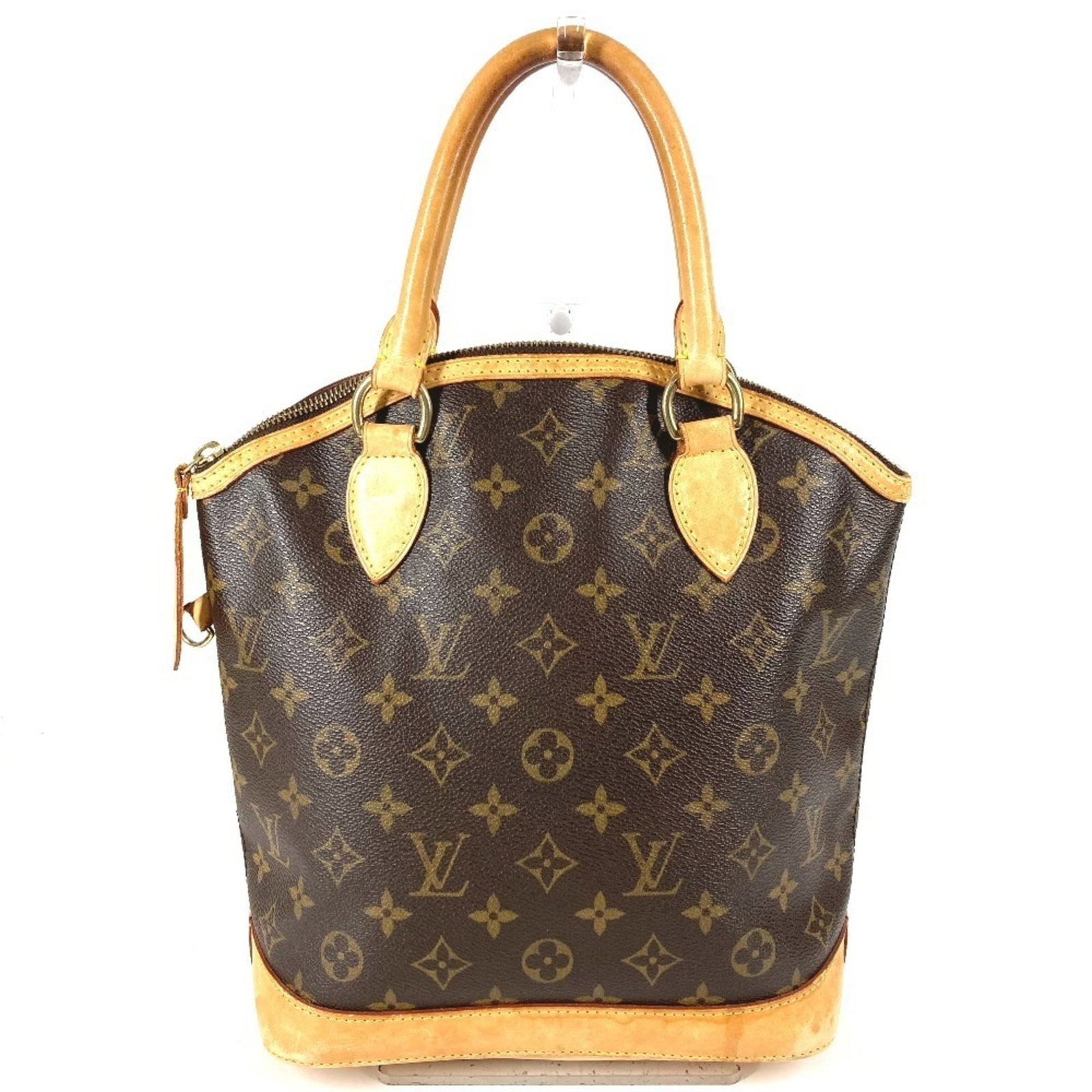 Handbag tote bag monogram Louis Vuitton: Handbag tote bag monogram Louis Vuitton Monogrammed tote bag from Louis Vuitton, crafted in brown monogram material with dimensions of 27cm x 23cm x 11cm. This classic design features the iconic LV