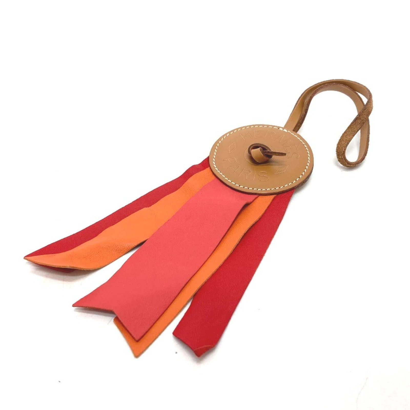 Milo Agneau Keyring Hermes: Milo Agneau Keyring Hermes Agneau Milo Keyring by Hermes features a unique multi-color design, showcasing the versatility and creativity of the Agneau Milo material. This stylish keyring measures 25cm