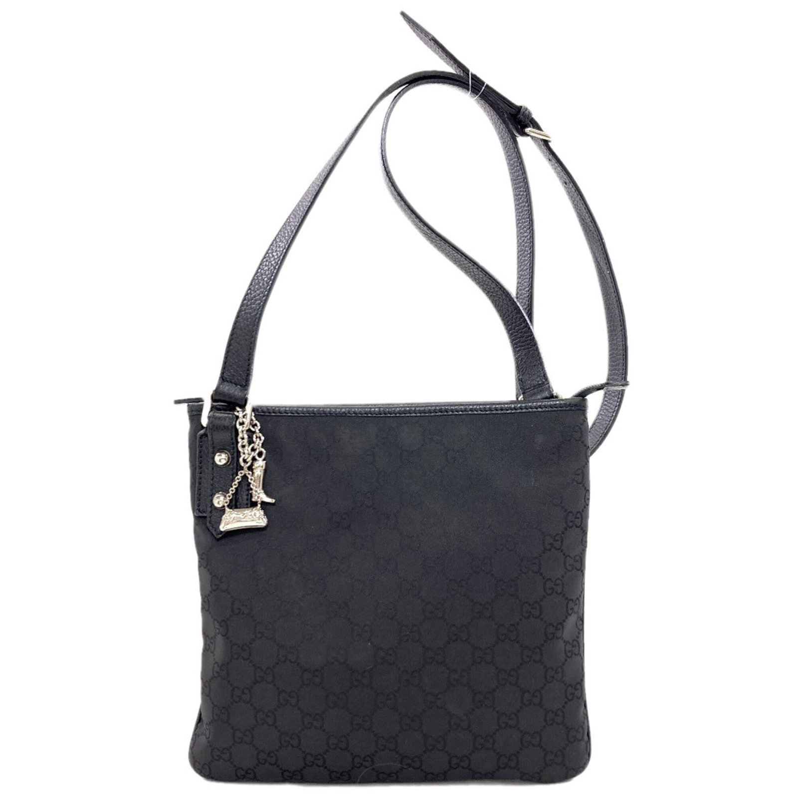 Shoulder Bag Nylon Gucci: Shoulder Bag Nylon Gucci Black Nylon Gucci Shoulder Bag, 23.5cm x 25cm x 2cm in size, features a classic design with a nylon material construction. The bag's sleek black color provides a versatile and
