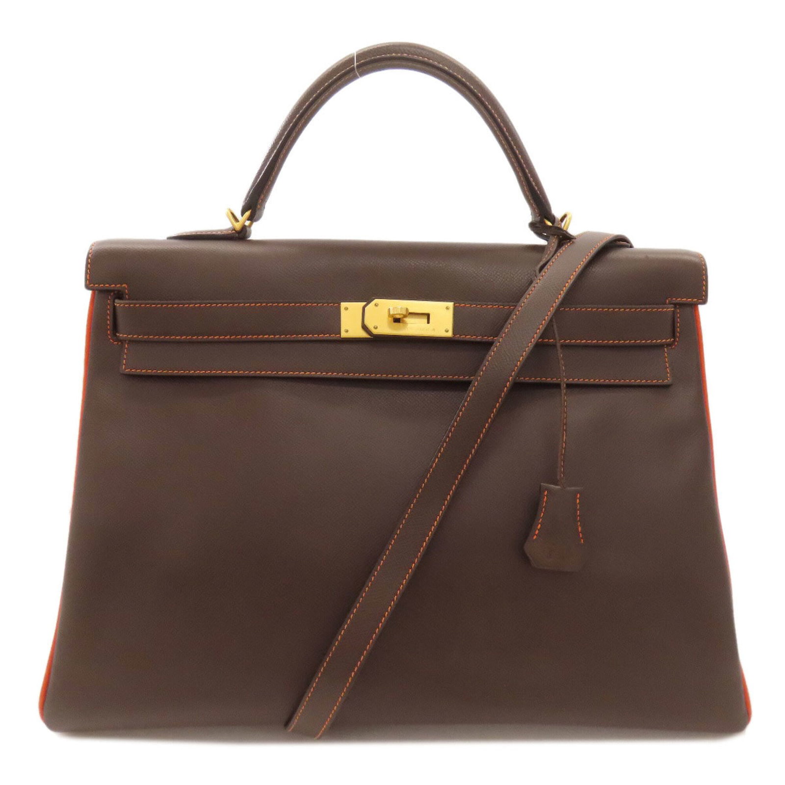 Epsom Leather Handbag Hermes: Epsom Leather Handbag Hermes Epsom leather handbags from Hermes are known for their exceptional durability and rich, earthy tones. This particular brown and orange Epsom leather handbag features a cla