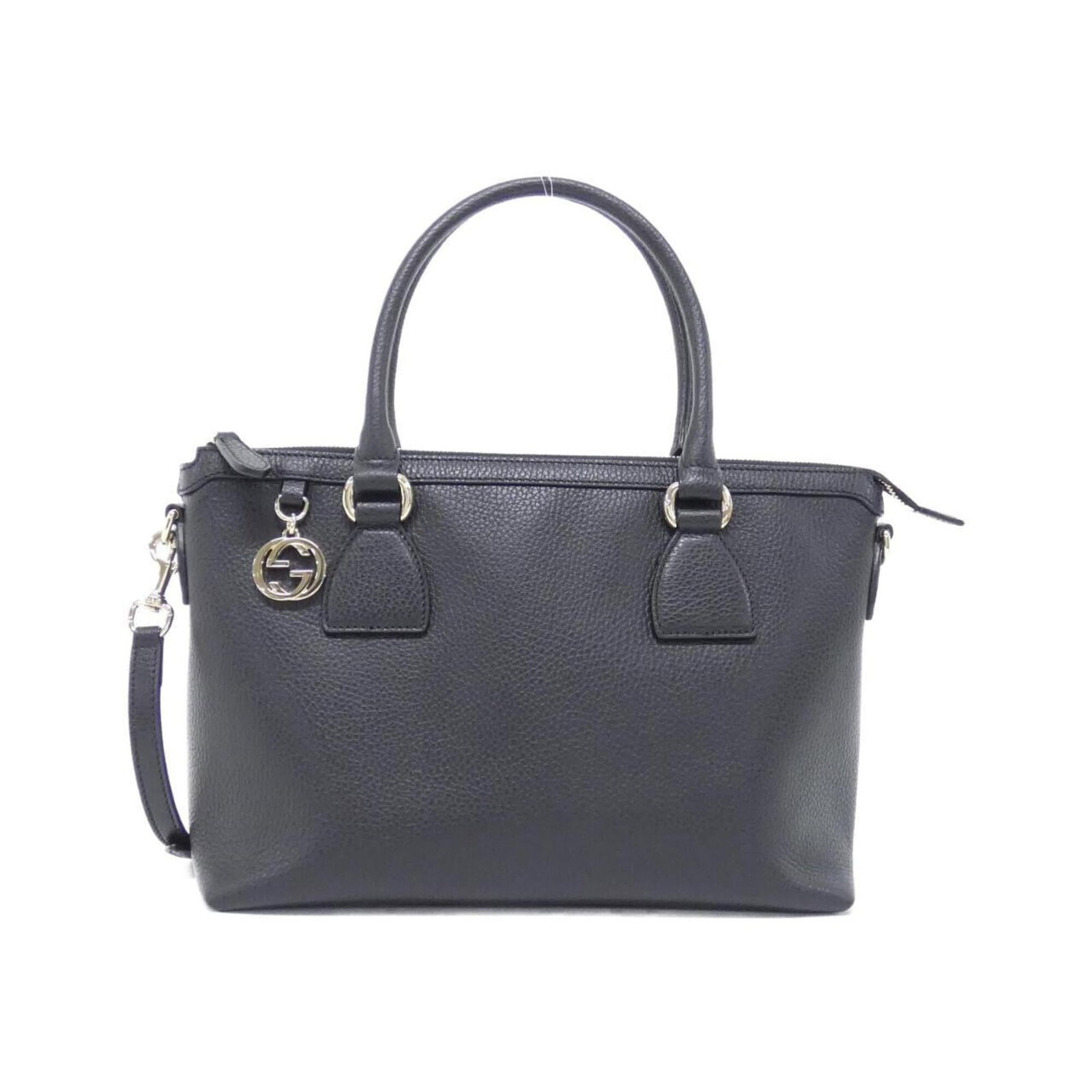 Gucci Handbag Leather: Gucci Handbag Leather Black Gucci leather handbag with dimensions 22cm x 34cm x 13cm. The bag's sleek design and high-quality leather make it a stylish accessory for women. Its classic size provides