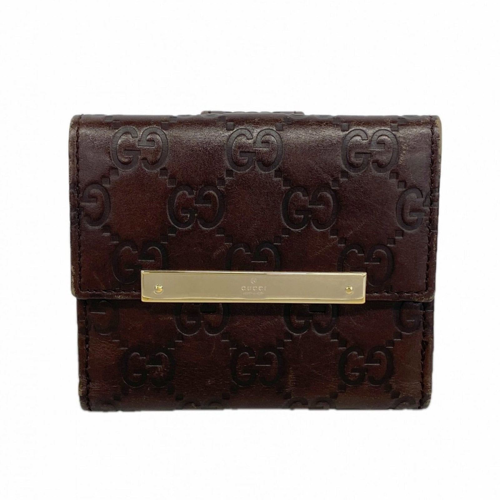 Gucci Wallet (Bi-Fold) Leather: Gucci Wallet (Bi-Fold) Leather Gucci's bi-fold leather wallet boasts sleek, classic design with clean lines and a sophisticated brown color. Made from high-quality leather, its compact size makes it e