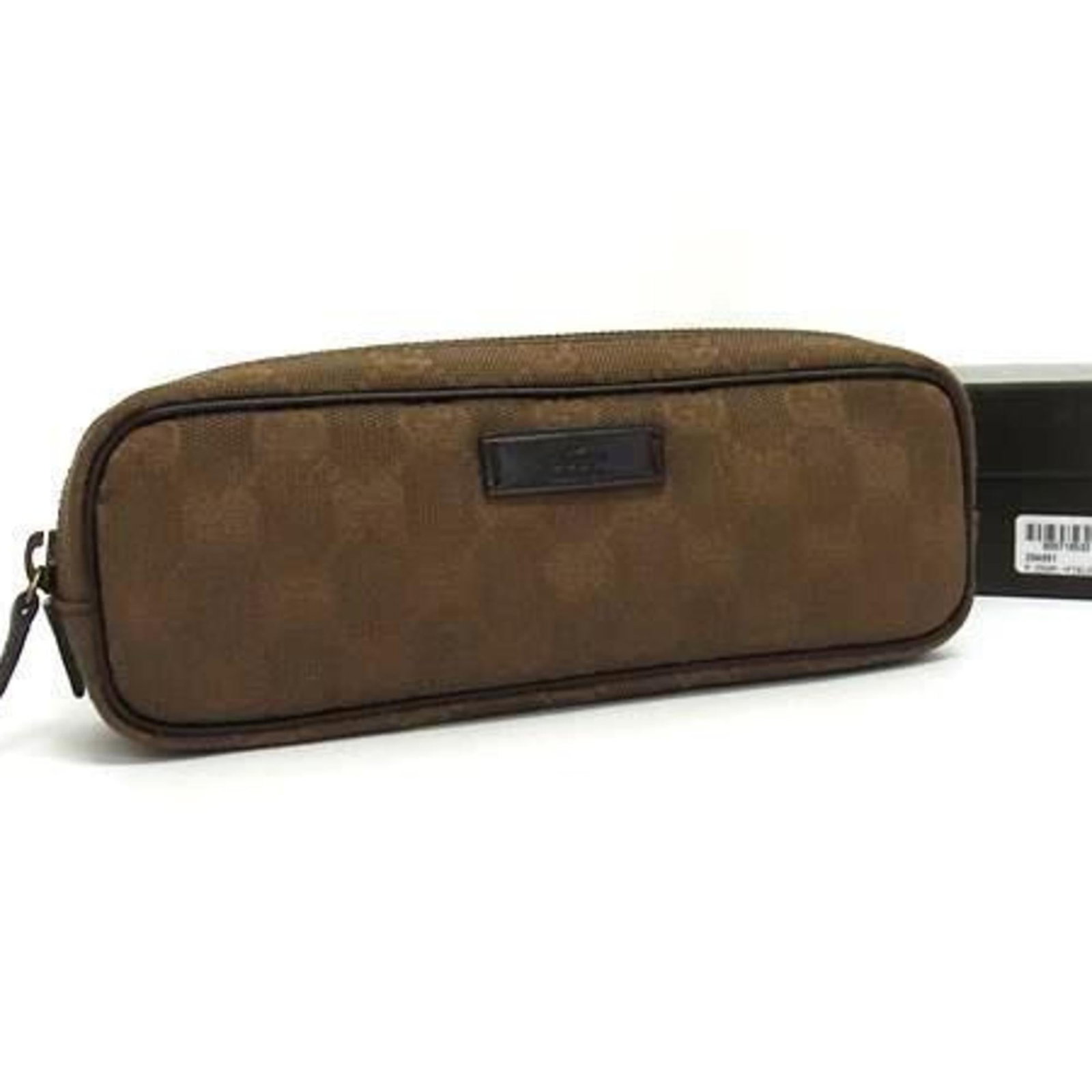Canvas pen case Gucci: Canvas pen case Gucci Brown GG canvas Gucci pen case with box. This classic design showcases the iconic GG pattern, adding a touch of luxury to your writing essentials. The compact size and stylish