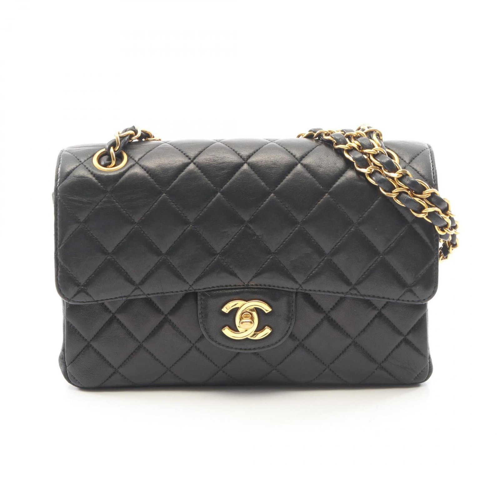 Chanel Handbag Shoulder Bag Leather: Chanel Handbag Shoulder Bag Leather This luxurious Chanel Matelasse leather shoulder bag boasts sleek black lambskin and gold hardware, exuding timeless elegance. With its spacious interior and adjust