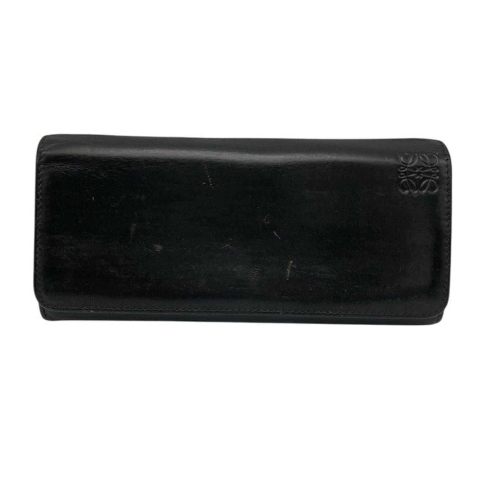 Long Wallet Bi Fold Leather: Long Wallet Bi Fold Leather Black leather long wallet with bi-fold design, measuring 8.5cm x 19cm x 2.5cm from Spain. Made from high-quality leather, this classic wallet features a sleek and