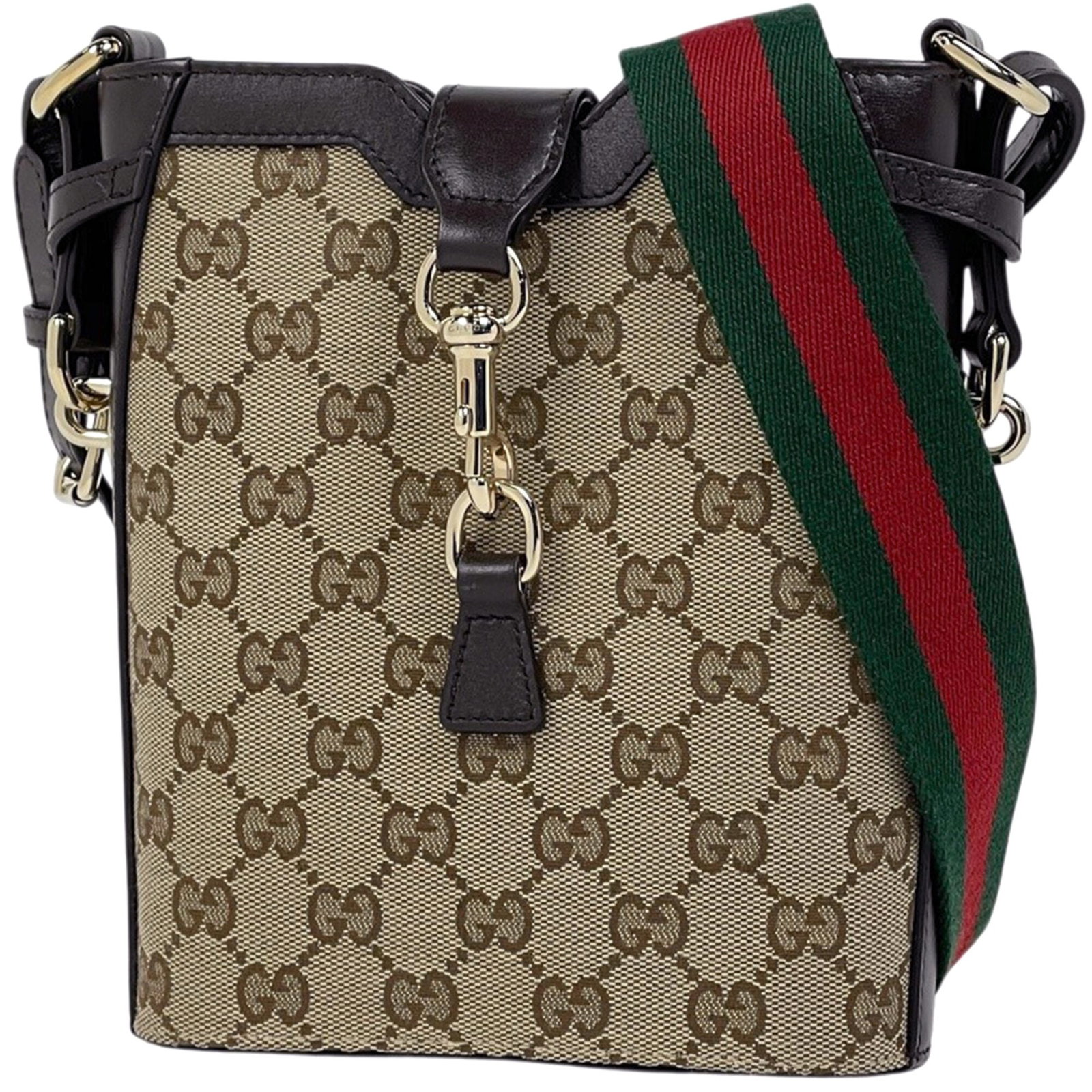 Shoulder Bag Canvas Leather Gucci: Shoulder Bag Canvas Leather Gucci GG canvas and leather come together in this classic Gucci shoulder bag, available in beige and brown hues. Measuring 19cm x 15.5cm x 5cm, it features a timeless desig