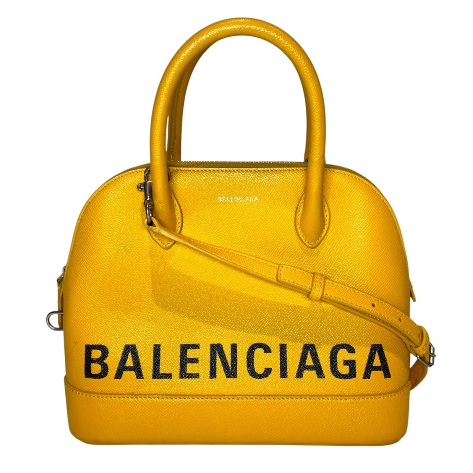 Balenciaga Handbag Leather: Balenciaga Handbag Leather Balenciaga Handbag Leather for sale, featuring high-quality yellow calfskin leather and a classic zipper closure. This stylish handbag measures 22cm x 26cm x 11cm and comes