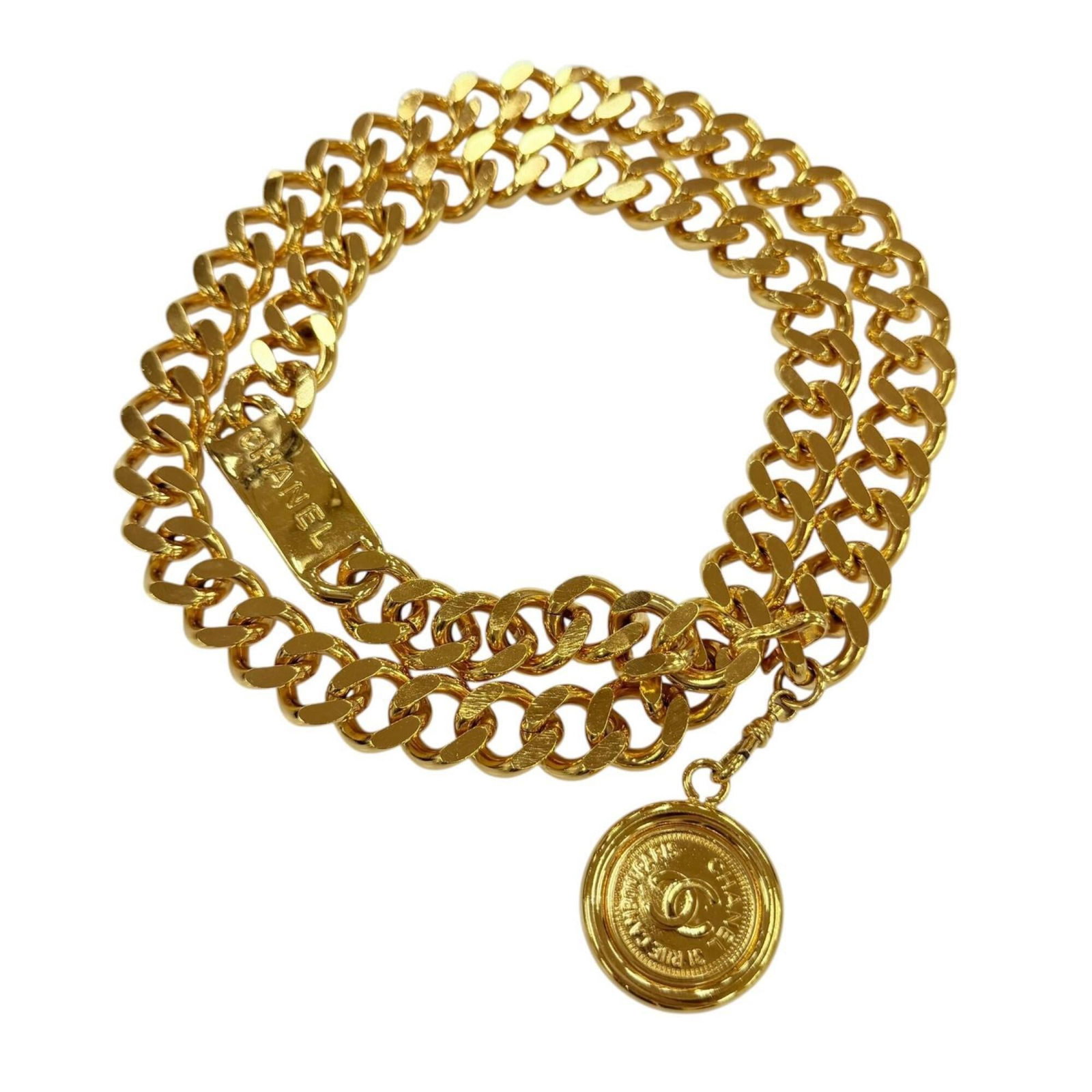 Chain Belt by Chanel: Chain Belt by Chanel Chain belt by Chanel, crafted from gold metal with a sleek and sophisticated design. Measuring 83cm in length, this chain belt adds a touch of luxury to any outfit. Its classic st