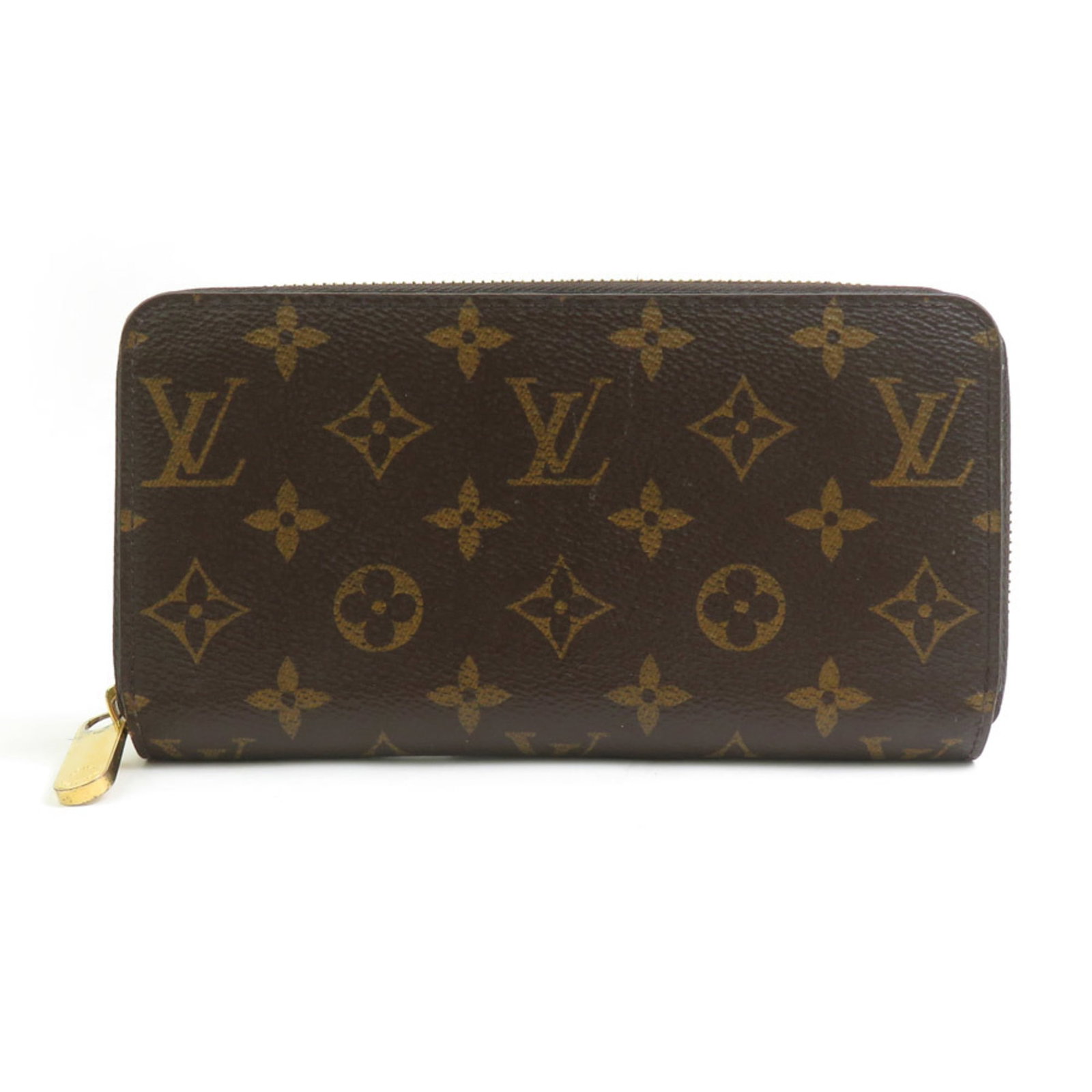 Louis Vuitton bi fold monogram wallet: Louis Vuitton bi fold monogram wallet Monogrammed luxury at its finest, this Louis Vuitton bi-fold wallet boasts the iconic monogram pattern in rich brown and galley hues. With a spacious interior