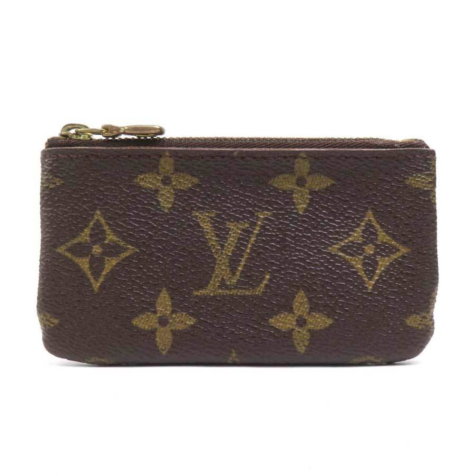 Louis Vuitton Purse Coin Case Monogram: Louis Vuitton Purse Coin Case Monogram Monogrammed with iconic Louis Vuitton design, this purse coin case boasts a rich brown color and the signature monogram pattern. Measuring 6.2cm x 11.5cm, it