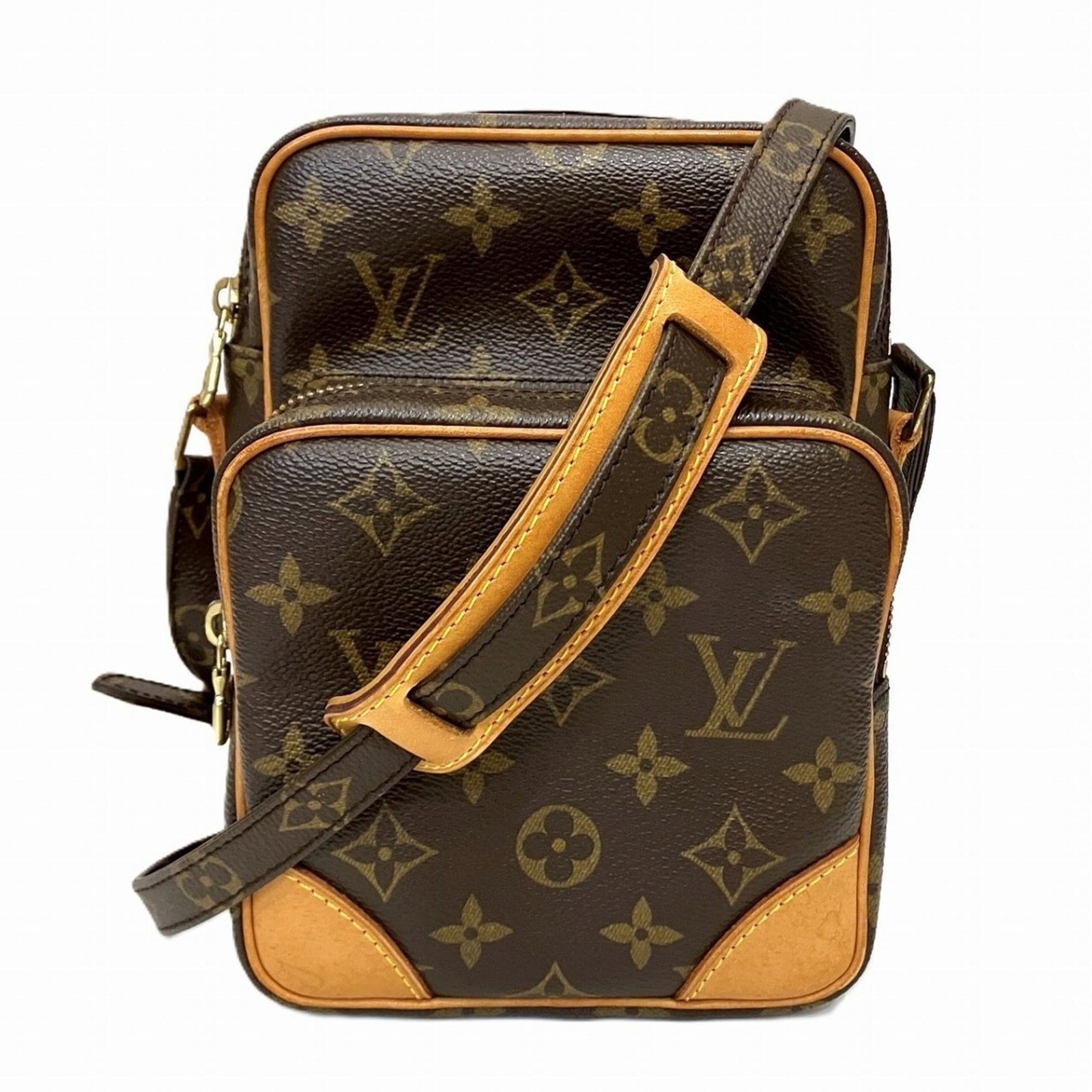 Shoulder Bag Monogram By Louis Vuitton: Shoulder Bag Monogram By Louis Vuitton Monogrammed by Louis Vuitton, this classic shoulder bag boasts the iconic monogram pattern in rich brown hues. With clean lines and a compact size, it's perfect 