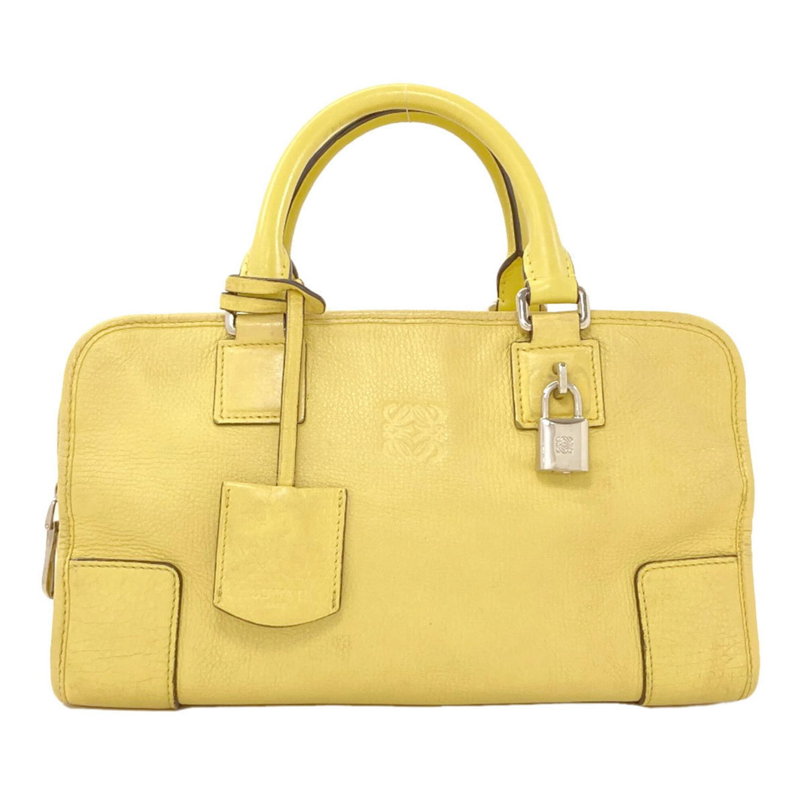 Loewe Handbag Leather: Loewe Handbag Leather Yellow Loewe Handbag Leather, measuring 17cm x 29cm x 13cm, offers a unique and stylish accessory for women. Made from high-quality leather, its vibrant yellow color adds a pop