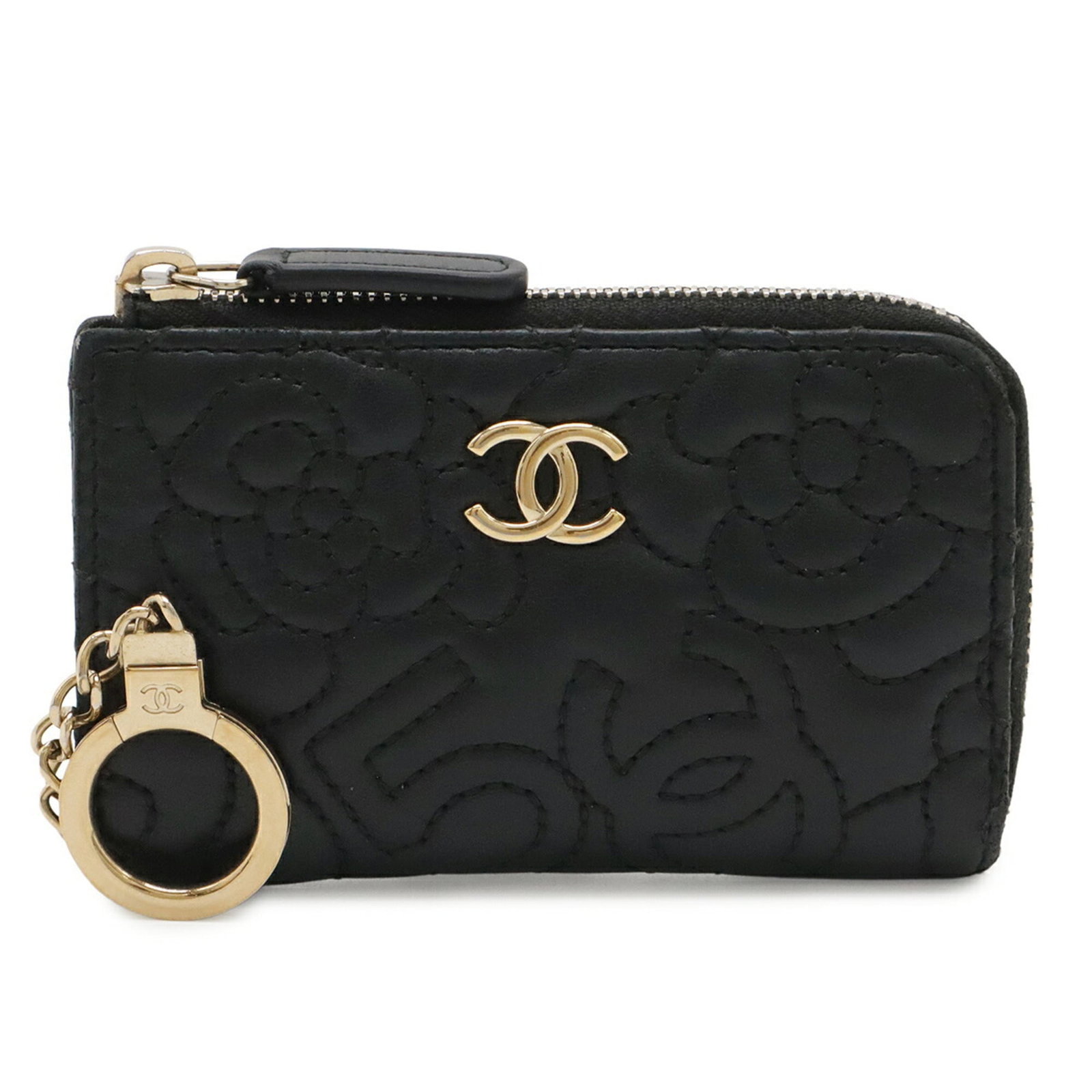 Coin purse in leather case: Coin purse in leather case The sleek leather case houses a compact coin purse, measuring 7cm x 11.5cm, with a black finish that adds a touch of sophistication to any accessory collection. This stylish