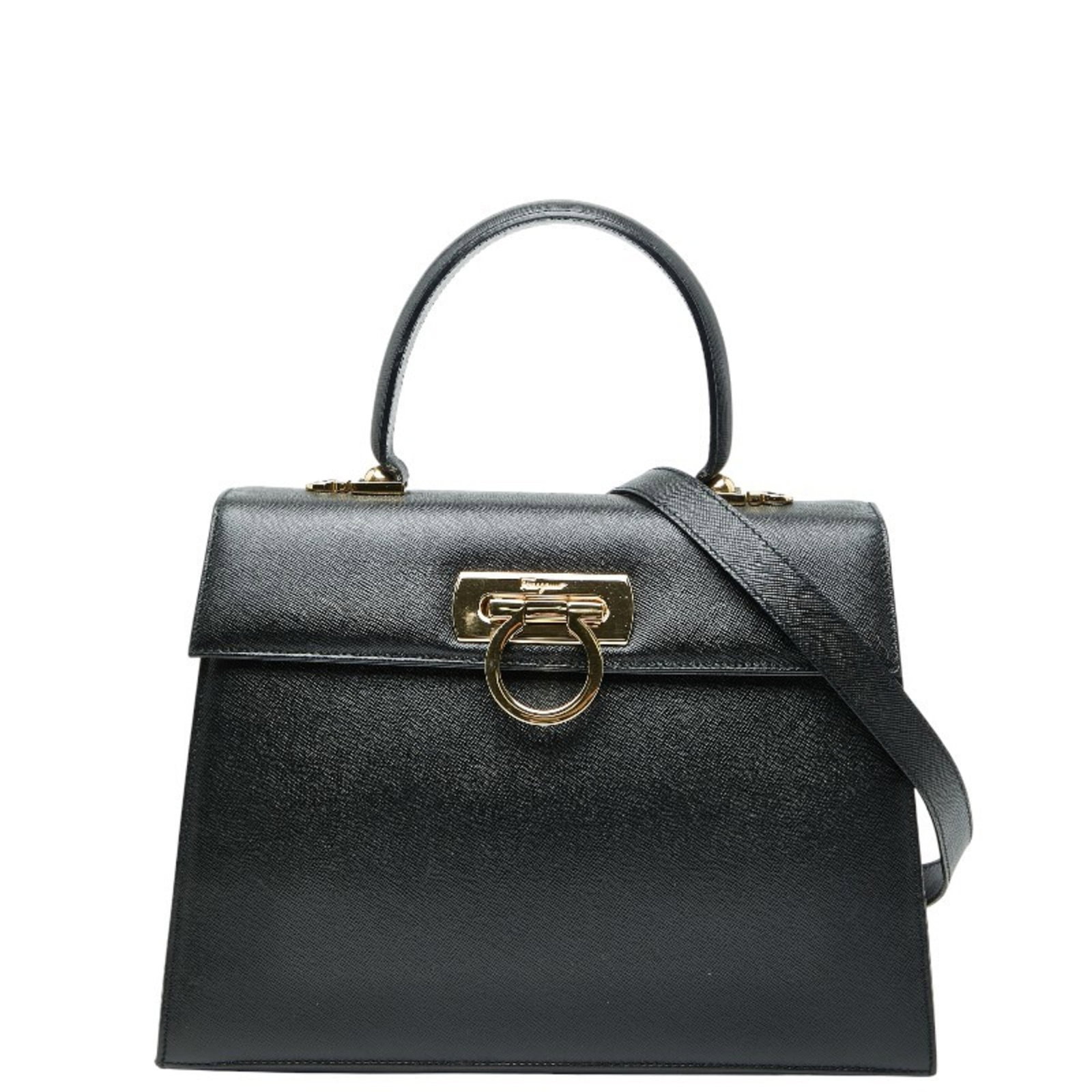 Handbag Salvatore Ferragamo Leather Shoulder: Handbag Salvatore Ferragamo Leather Shoulder Black leather shoulder bag from Salvatore Ferragamo, featuring a classic design with clean lines and a timeless silhouette. The bag comes with a dust bag