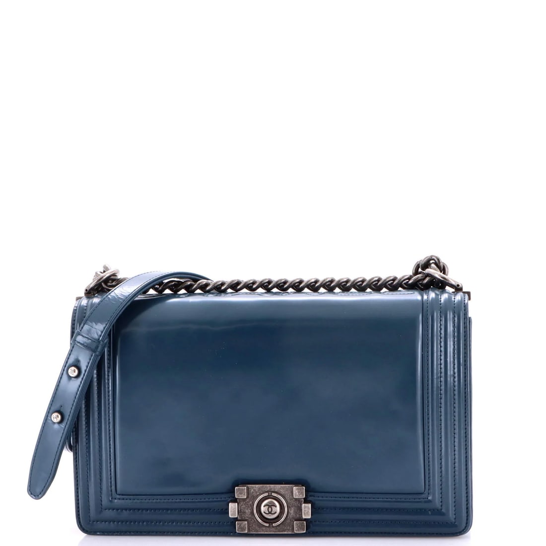 Chanel Reverso Boy Flap Bag Glazed Calfskin Old Medium: Chanel Reverso Boy Flap Bag Glazed Calfskin Old Medium Chanel's iconic Reverso Boy Flap Bag boasts a stunning glazed calfskin exterior in blue, adding a touch of sophistication to any outfit. Measurin