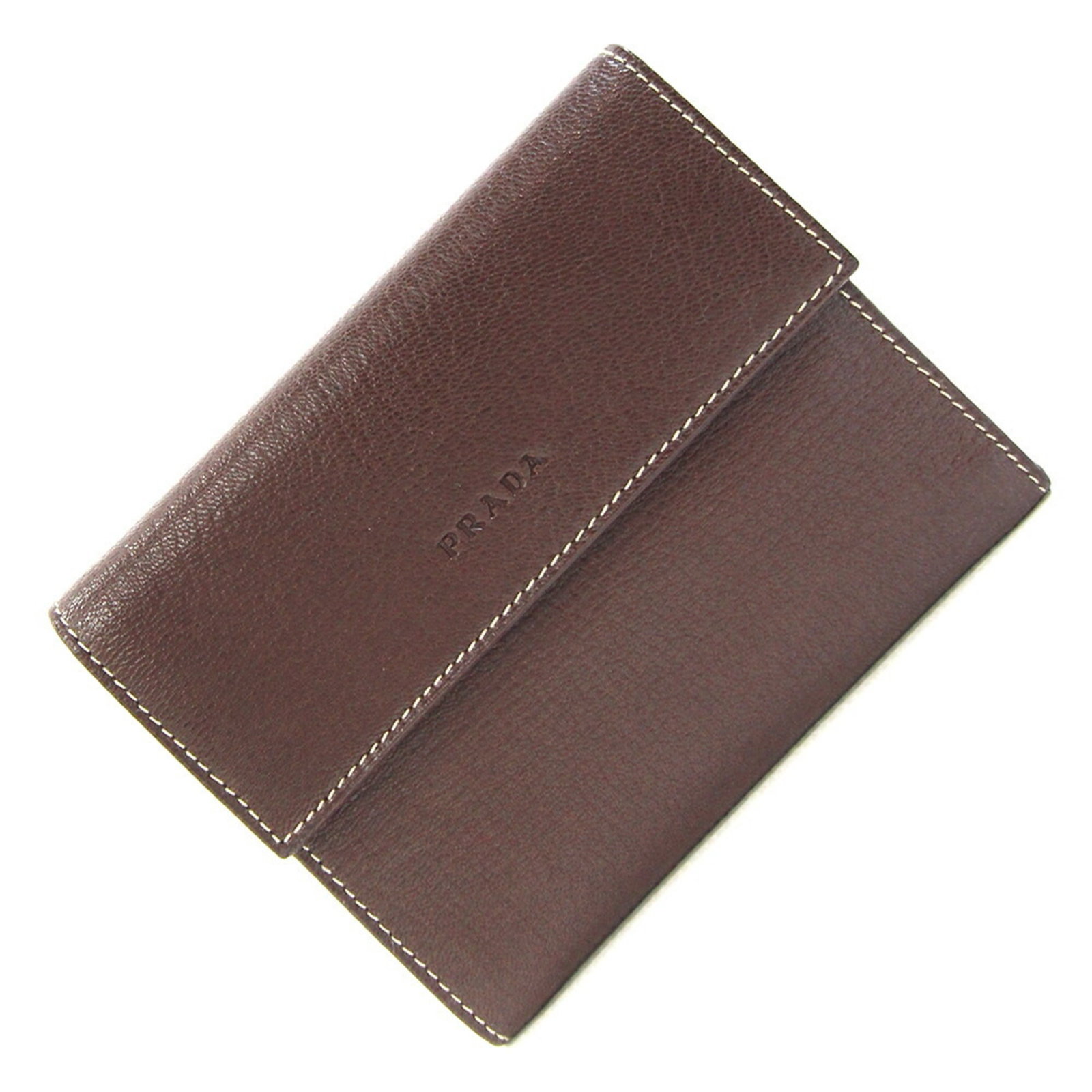 Prada Wallet (Tri-Fold) Leather: Prada Wallet (Tri-Fold) Leather Cacao, Dark brown leather Prada tri-fold wallet with clean lines and classic design. Made from high-quality leather, this stylish accessory features a timeless