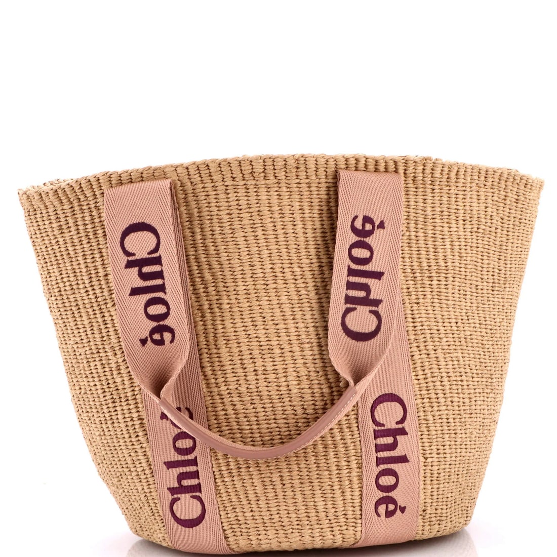 Chloe x Mifuko Large Raffia Woody Tote: Chloe x Mifuko Large Raffia Woody Tote Neutral canvas and raffia exterior, paired with leather accents, make this Chloe x Mifuko Large Raffia Woody Tote a stylish and unique accessory. Measuring 12"