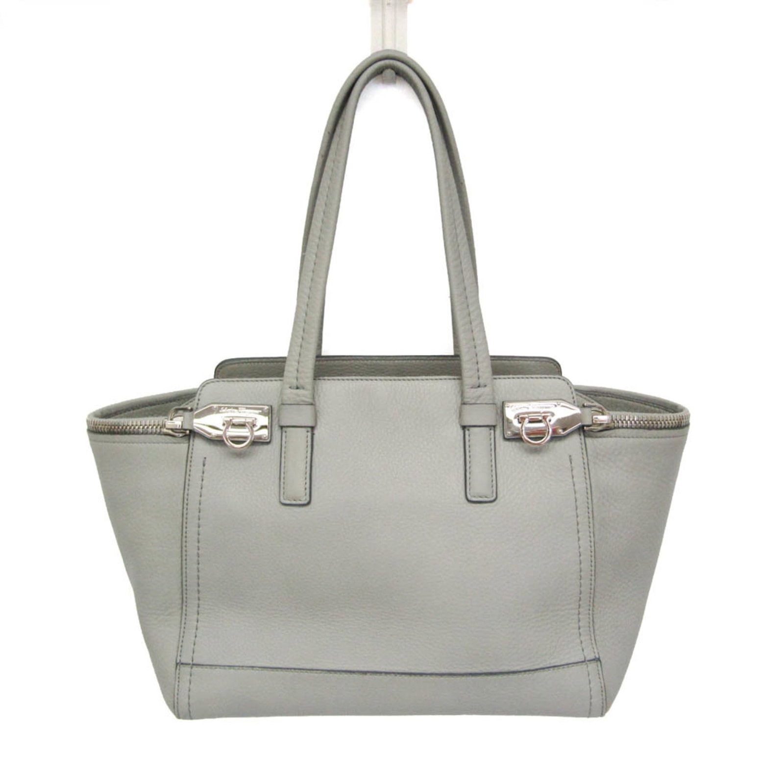 Ferragamo Salvatore Handbag Leather Tote: Ferragamo Salvatore Handbag Leather Tote The Salvatore Ferragamo DY-21 D698 Leather Tote boasts sleek design with a gray leather exterior, featuring two zipper pockets for added functionality. With