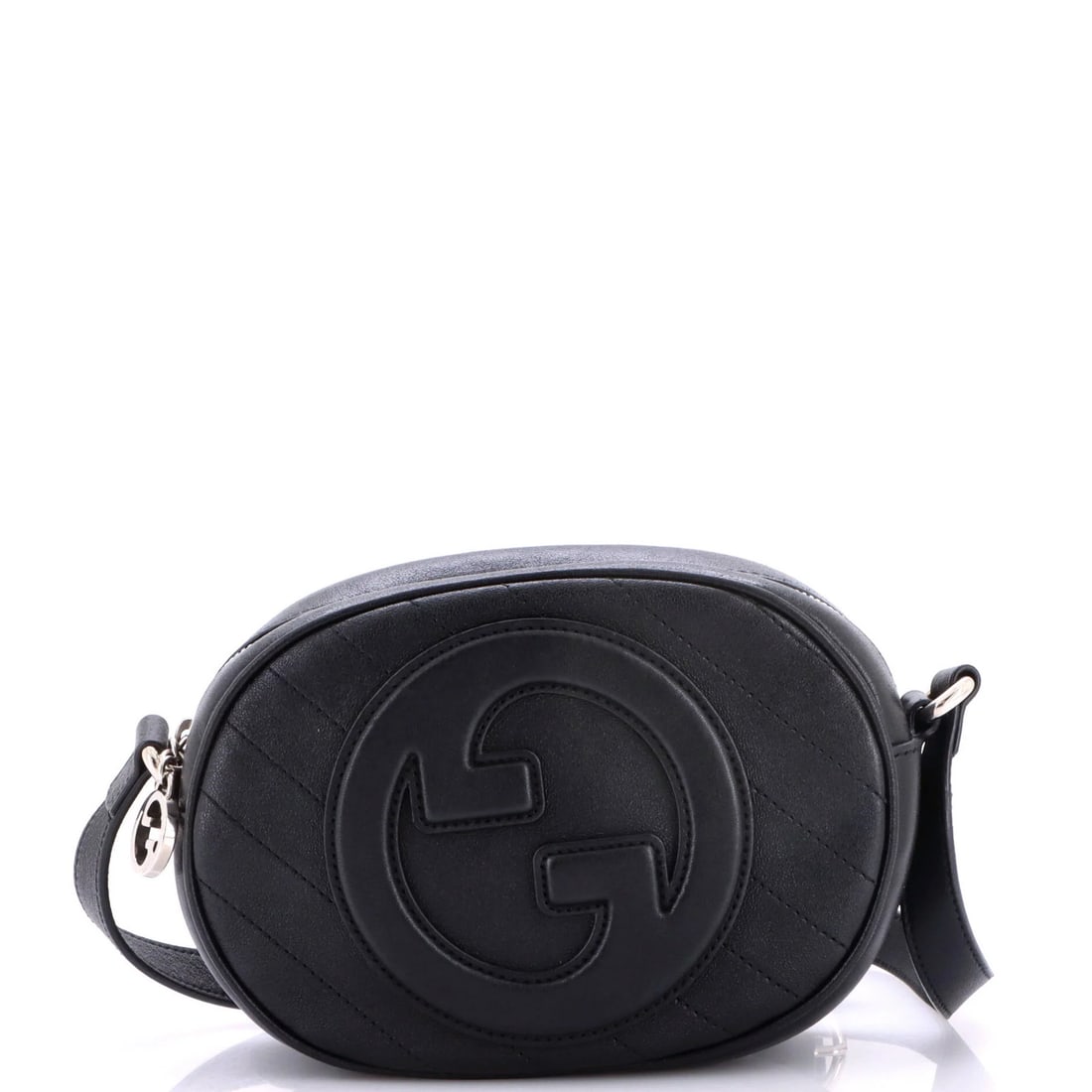 Quilted Leather Round Diagonal Camera Bag Blondie: Quilted Leather Round Diagonal Camera Bag Blondie The Gucci Blondie round camera bag boasts a striking quilted leather exterior in black, adding a touch of sophistication to your photography gear. Mea
