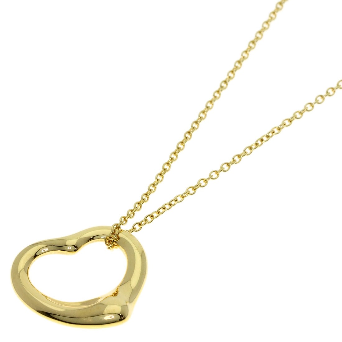 Yellow Gold Tiffany Necklace K18 Open Heart: Yellow Gold Tiffany Necklace K18 Open Heart K18 Yellow Gold Tiffany Necklace Open Heart features a sleek, gold metal design with no main stone. The necklace measures 15.7 inches in length and boasts