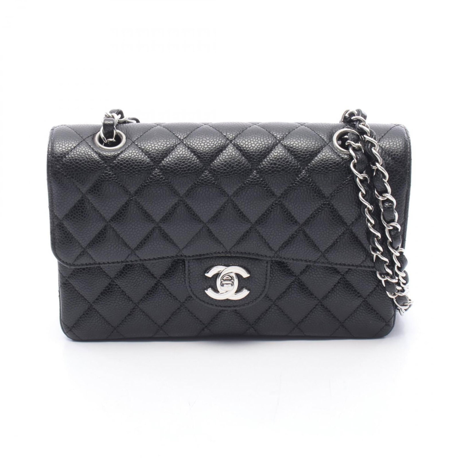 Calfskin handbag bag shoulder Chanel: Calfskin handbag bag shoulder Chanel Calfskin handbag bag shoulder Chanel features a sleek black design made from high-quality grained calfskin. The compact size, measuring 14cm x 23cm x 6cm, makes it