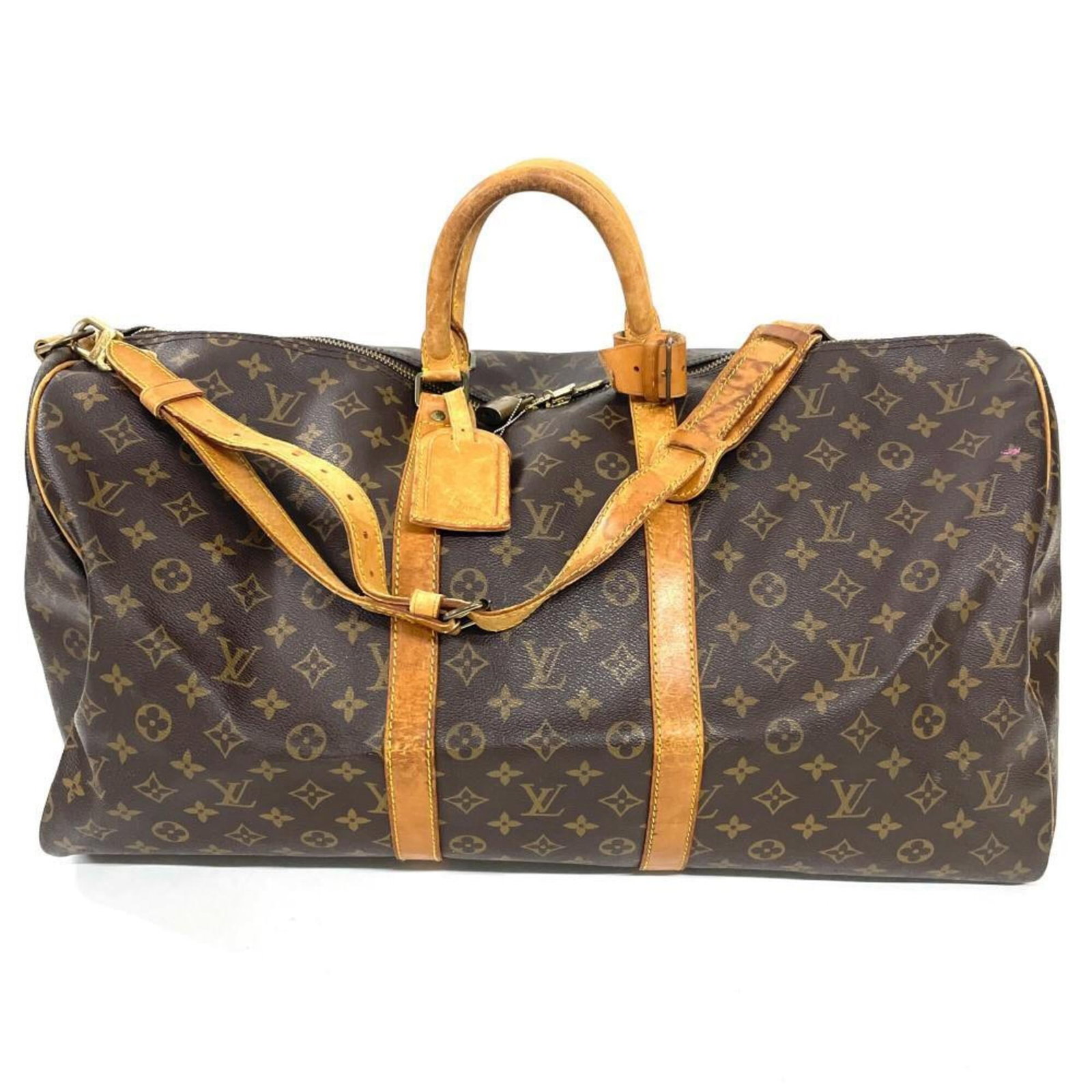 Boston Bag Monogram Canvas Louis Vuitton: Boston Bag Monogram Canvas Louis Vuitton Brown Monogram Canvas Louis Vuitton Boston Bag. This classic bag features the iconic monogram pattern in brown canvas, with precise stitching and a timeless