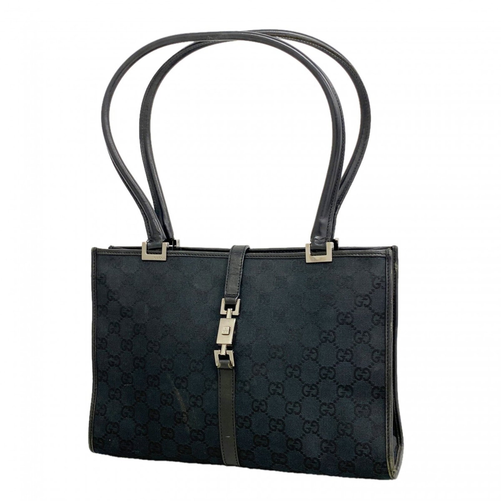 Canvas handbag Gucci: Canvas handbag Gucci Canvas handbag with sleek black canvas exterior and silver hardware, featuring a classic design that exudes timeless sophistication. Measuring 21cm x 30cm x 9.5cm, this Gucci MPN