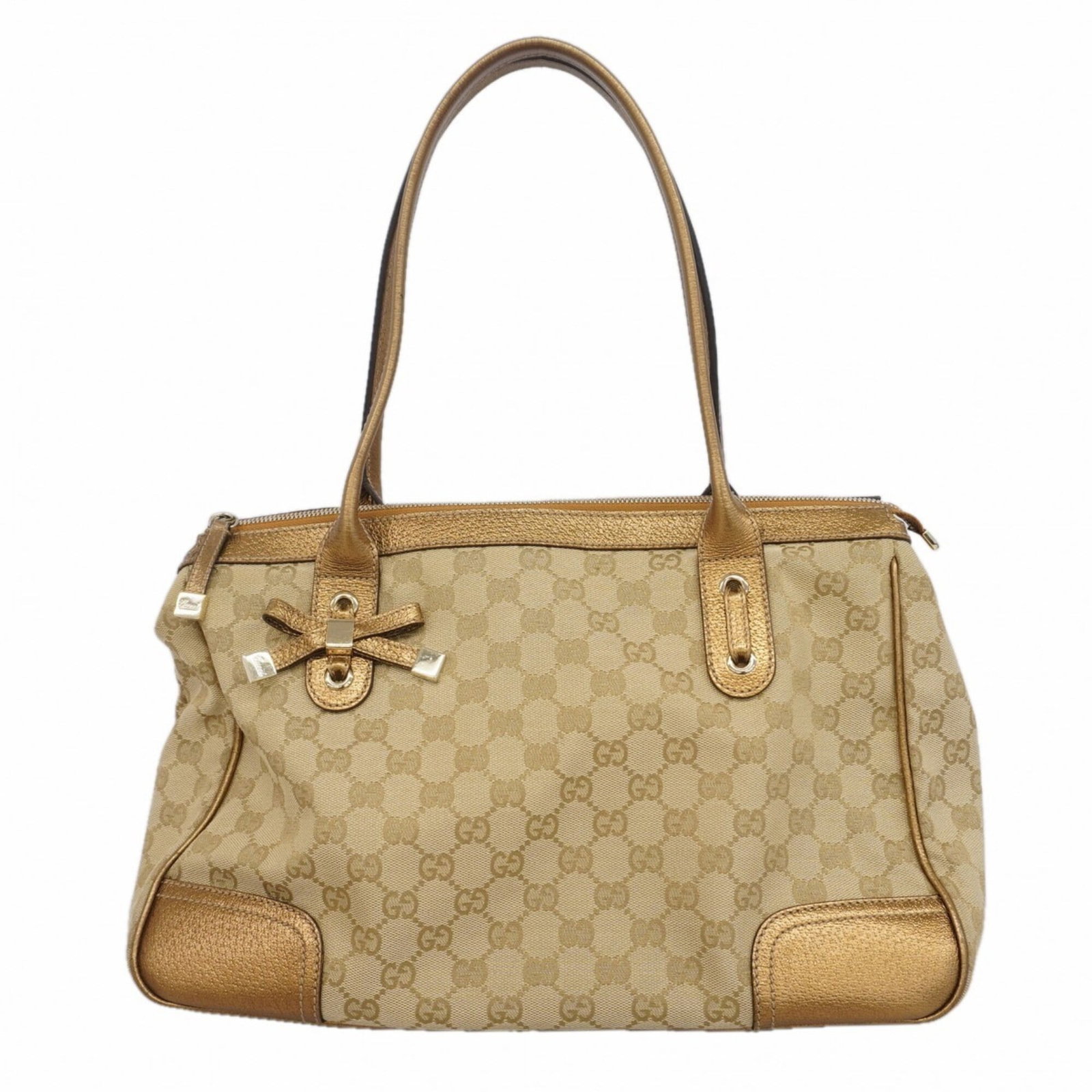 Gucci Tote Bag Canvas: Gucci Tote Bag Canvas Canvas tote bag from Gucci, featuring gold and light brown hues in a champagne gold hardware finish. Measuring 24cm x 32cm x 12cm, this stylish accessory boasts a classic design