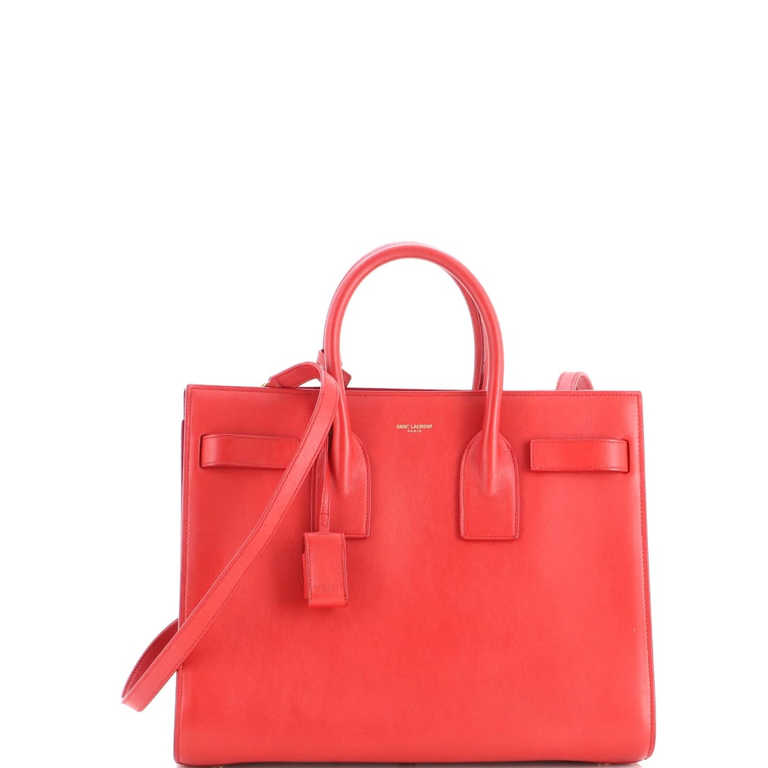 Saint Laurent Sac de Jour NM Bag Leather Small: Saint Laurent Sac de Jour NM Bag Leather Small Small Saint Laurent Sac de Jour Leather Bag in Red, featuring a classic totes style with gold hardware and clochette keys. This pre-owned bag measures