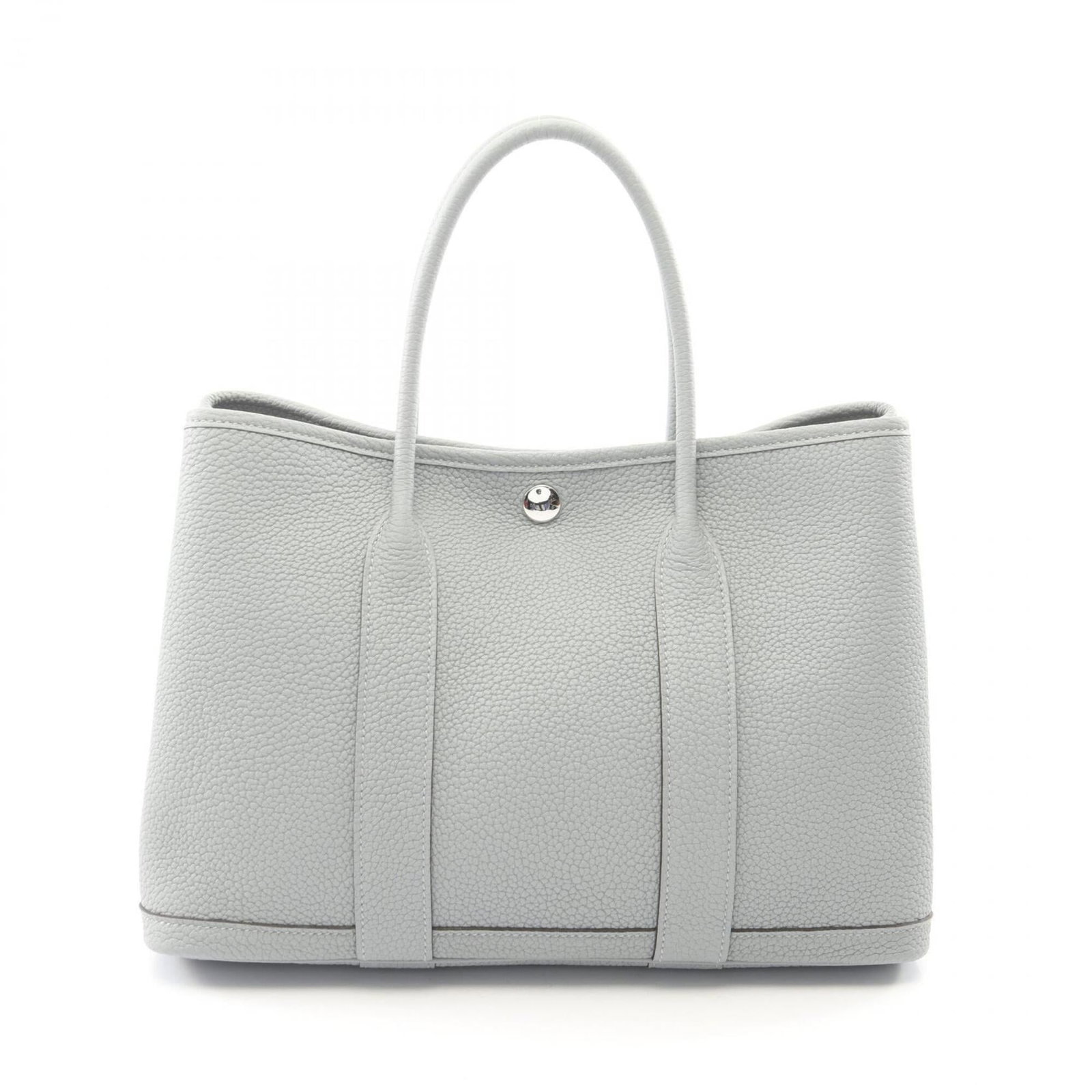 Hermes Handbag Negonda Leather Tote: Hermes Handbag Negonda Leather Tote The Hermes Negonda Leather Tote boasts its sleek gray color and elegant design, making it a stylish accessory for everyday use. Measuring 21cm x 30cm x 14cm, this