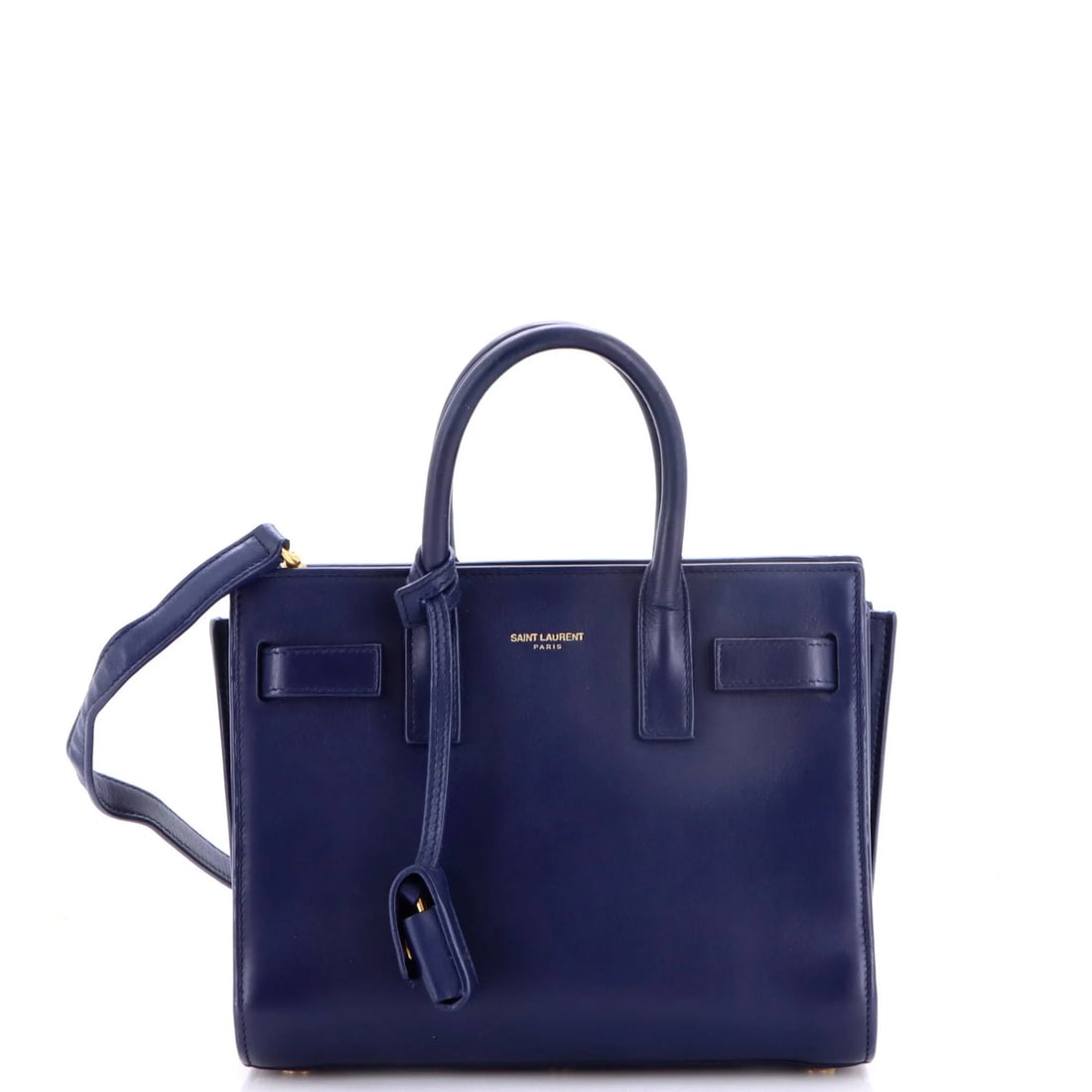 Leather bag nano sac de jour saint laurent: Leather bag nano sac de jour saint laurent Blue Saint Laurent Leather Nano Sac de Jour Bag with Clochette Lock, featuring a sleek design and durable leather exterior. The bag's interior boasts suede