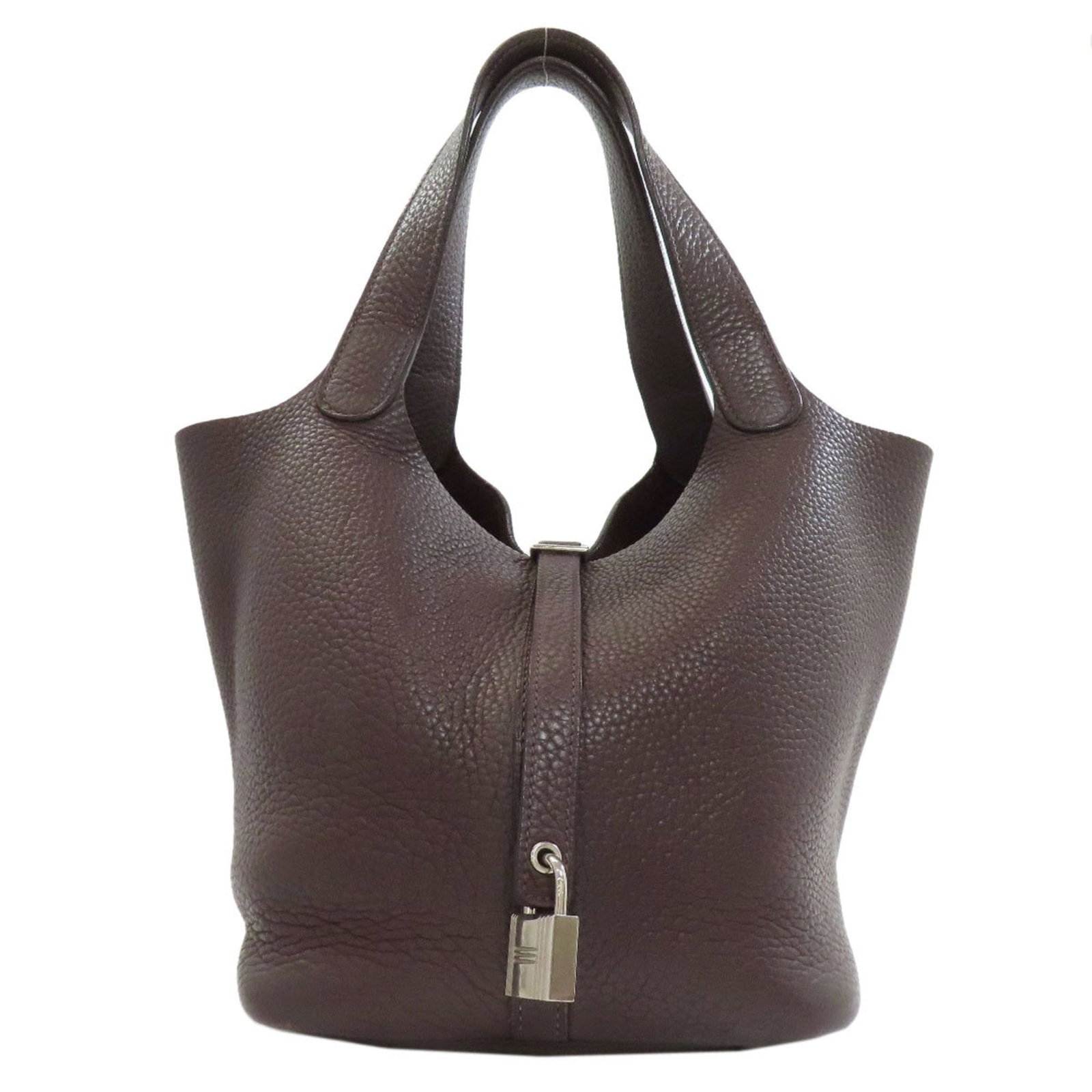 Handbag Leather by Hermes: Handbag Leather by Hermes Brown leather handbag by Hermes, measuring 21cm x 18cm x 22cm. Made from high-quality leather, this classic design exudes timeless elegance. A beautifully crafted accessory f