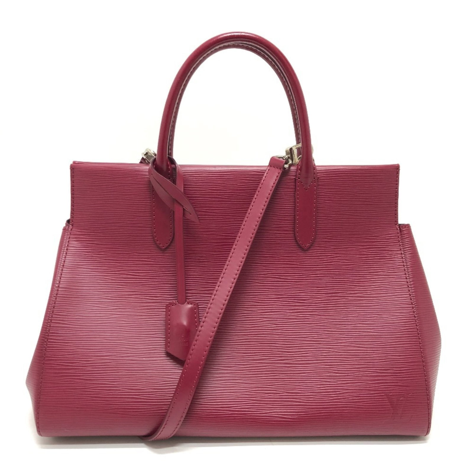Louis Vuitton Handbag Epi Leather: Louis Vuitton Handbag Epi Leather Epi leather craftsmanship shines in this vibrant fuchsia Louis Vuitton handbag, adorned with silver hardware and featuring a sleek magnet closure. The bag's compact s
