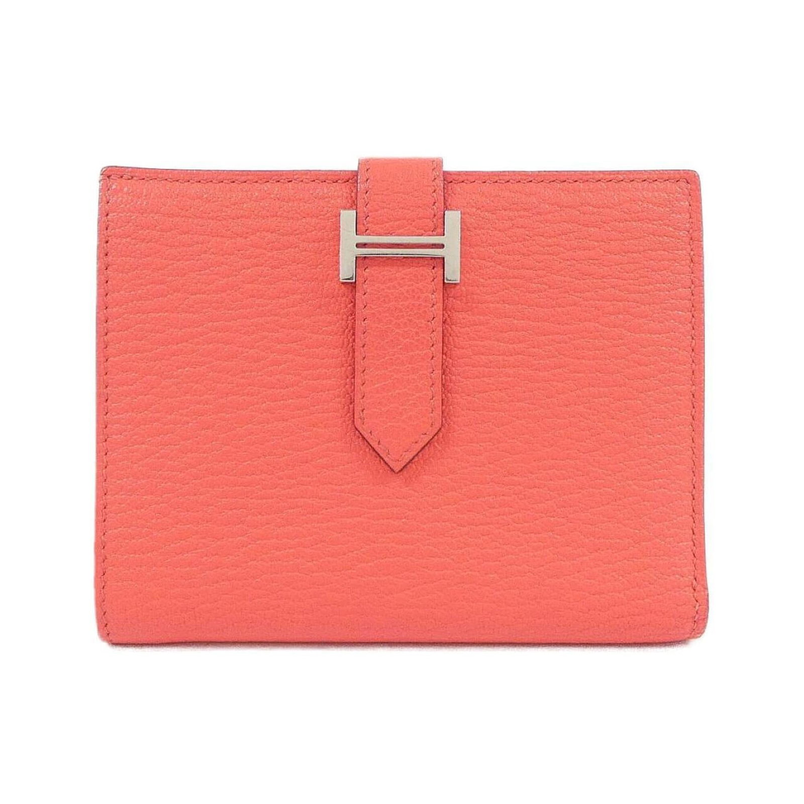 Chevre Leather Bi Fold Wallet Hermes: Chevre Leather Bi Fold Wallet Hermes Chevre leather bi-fold wallet from Hermes features pink color and compact size, making it a stylish accessory for everyday use. The chevre leather material adds a 