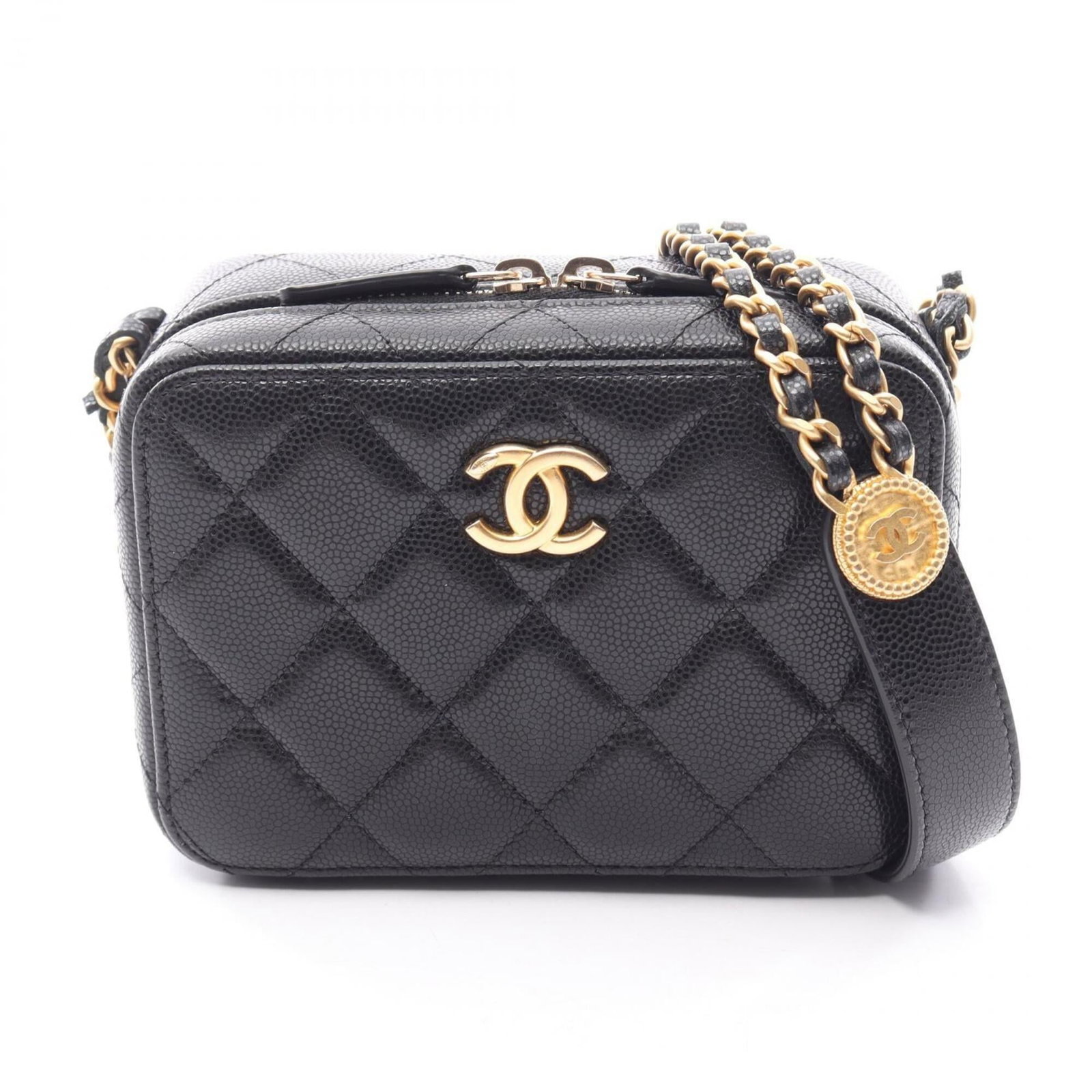 Calfskin handbag bag shoulder Chanel: Calfskin handbag bag shoulder Chanel Calfskin handbag bag shoulder Chanel features a sleek design with grained Calfskin material in black and gold hardware. The compact size measures 10cm x 14cm x
