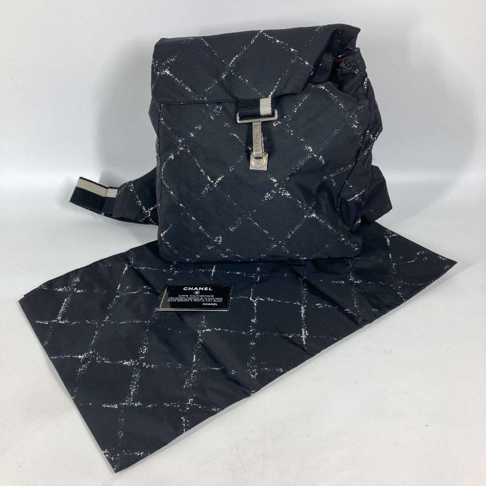 Chanel Backpack Travel Line: Chanel Backpack Travel Line Black and White Chanel Backpack Travel Line - A sleek and compact design, measuring 28cm x 24cm x 6.5cm, perfect for a stylish and organized travel companion. The black and