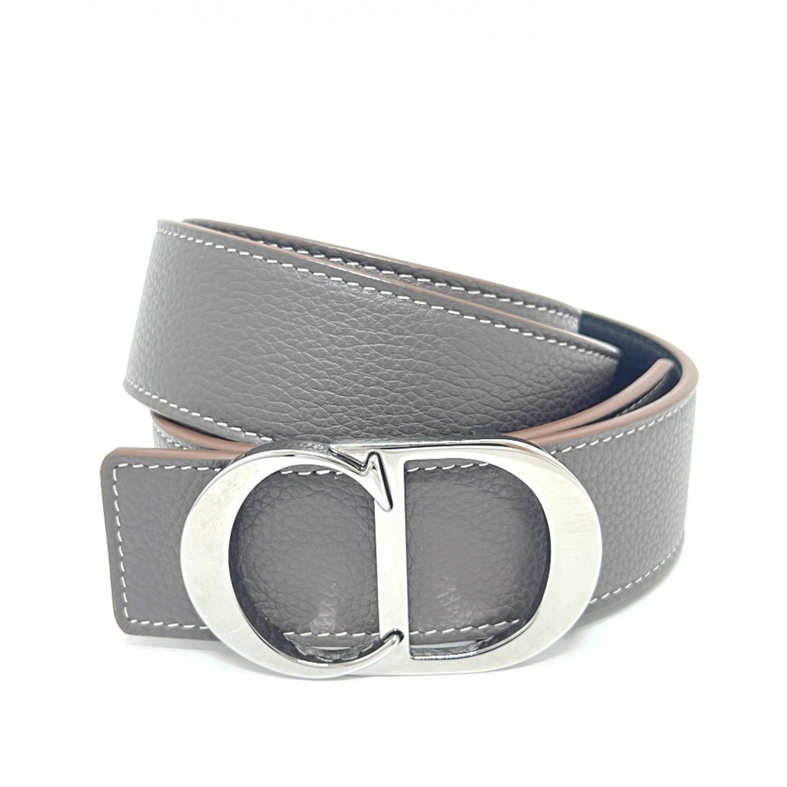 Standard Belt by Christian Dior: Standard Belt by Christian Dior Standard Belt by Christian Dior, crafted from high-quality leather in black and brown hues, offers a sleek and sophisticated design. Measuring 93cm-103cm in length, it