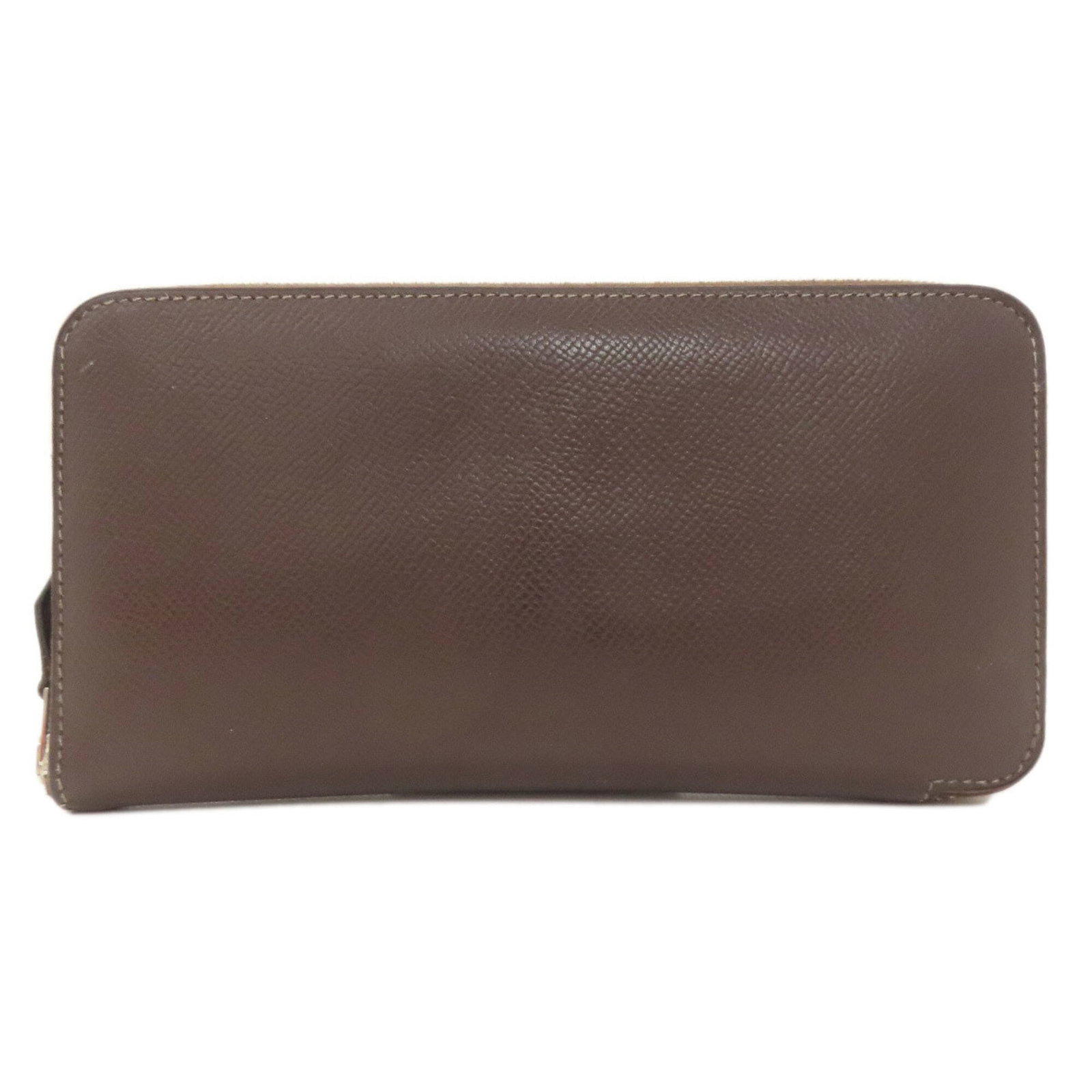 Epsom Leather Bi Fold Wallet Hermes: Epsom Leather Bi Fold Wallet Hermes Epsom leather, a rich and luxurious material, gives this bi-fold wallet its distinctive look. The dark brown color adds depth and sophistication, while the zipper