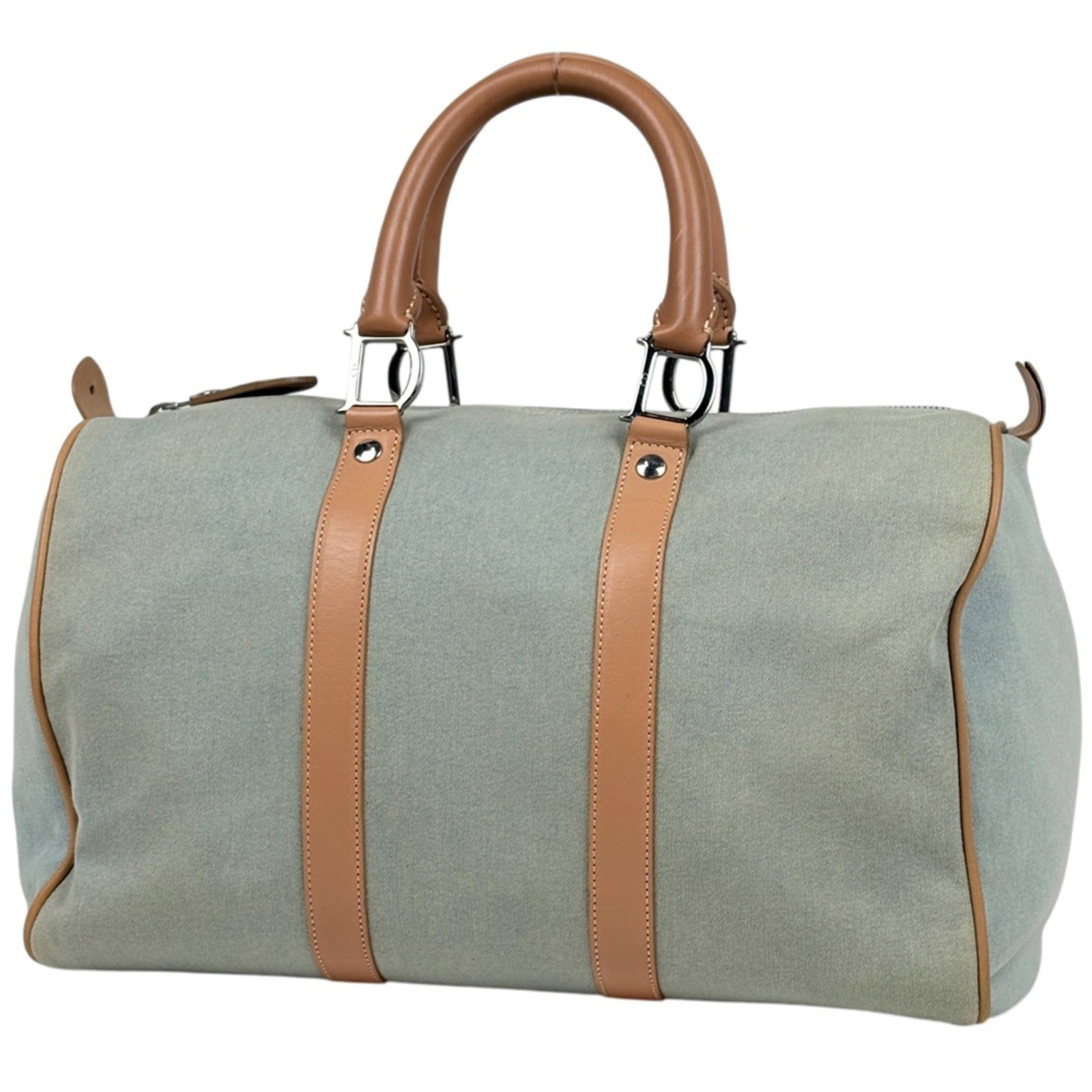 Canvas by Dior Christian: Canvas by Dior Christian Canvas by Dior Christian, a unique handbag featuring canvas material in beige and light green hues. Measuring 22cm x 35cm x 17cm, this compact bag boasts a distinctive