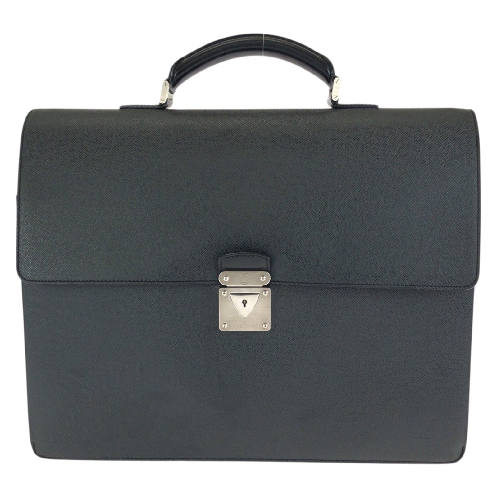 Taiga leather briefcase by Louis Vuitton: Taiga leather briefcase by Louis Vuitton Taiga leather briefcase by Louis Vuitton, crafted from high-quality Taiga leather in black. This classic design measures 33cm x 41cm x 10cm and features a time